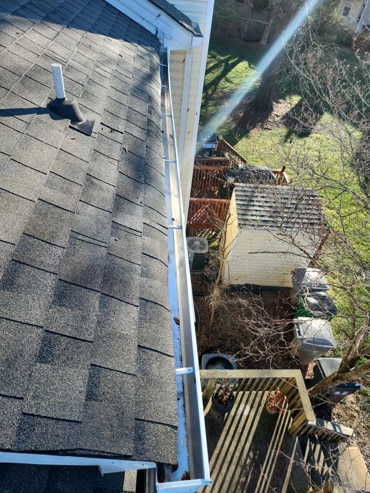 Gutter Cleaning using water by Power Wash Masters LLC