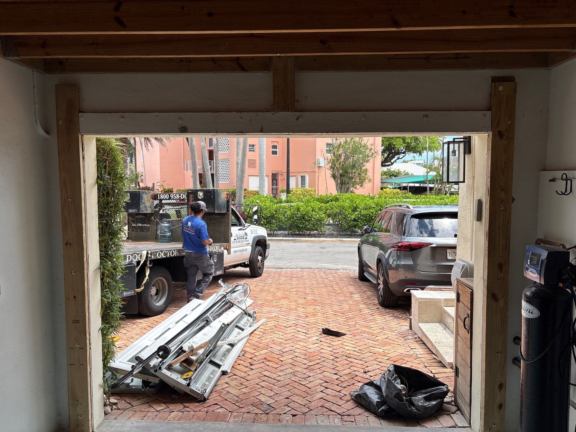 Clopay Modern Steel Garage Door Installation in Fort Lauderdale by The Door Doctor of South Florida, Inc.