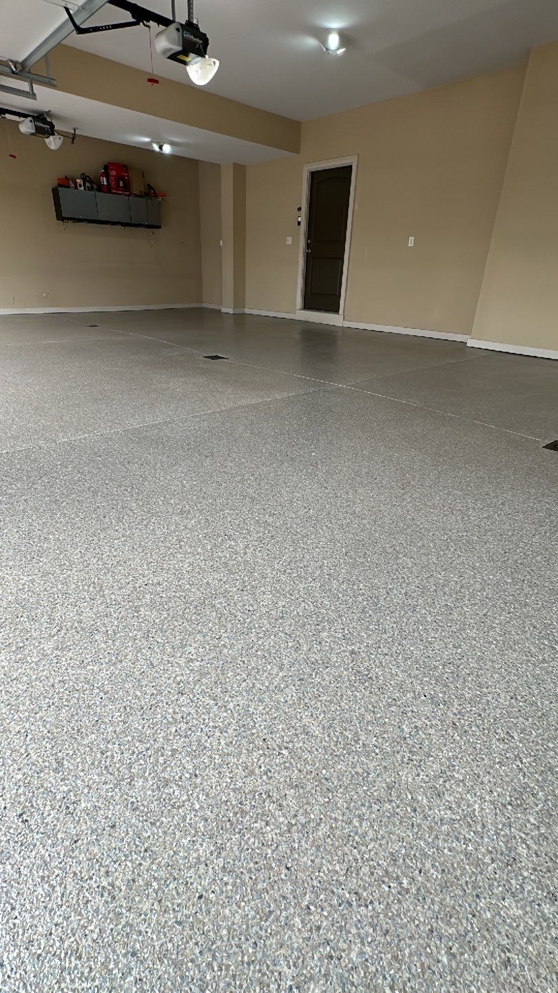 Large Patio + Garage Project in Moon Township by Floors in a Day, Inc