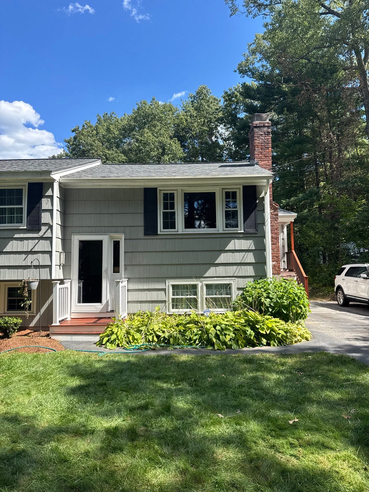 Roof, Trim & Chimney Restoration – Chelmsford, MA by Mighty Dog Roofing of Greater Middlesex County