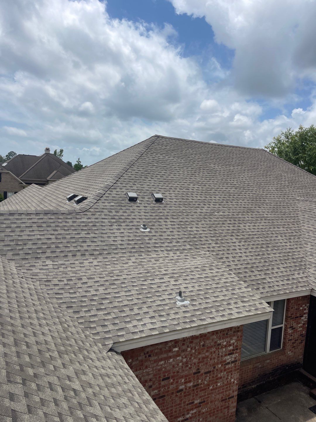 Residential Roofing Installation using Roof Replacement by American Roofing & Construction LLC