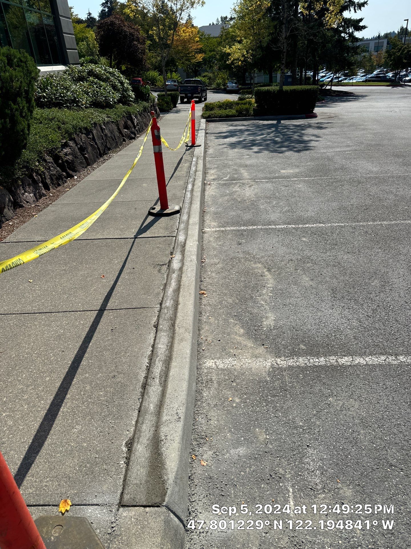 Kidder Matthews | Parking Lot Sealcoating & Striping with Concrete Curb & Patch Repairs  by Jireh Asphalt & Concrete Inc 