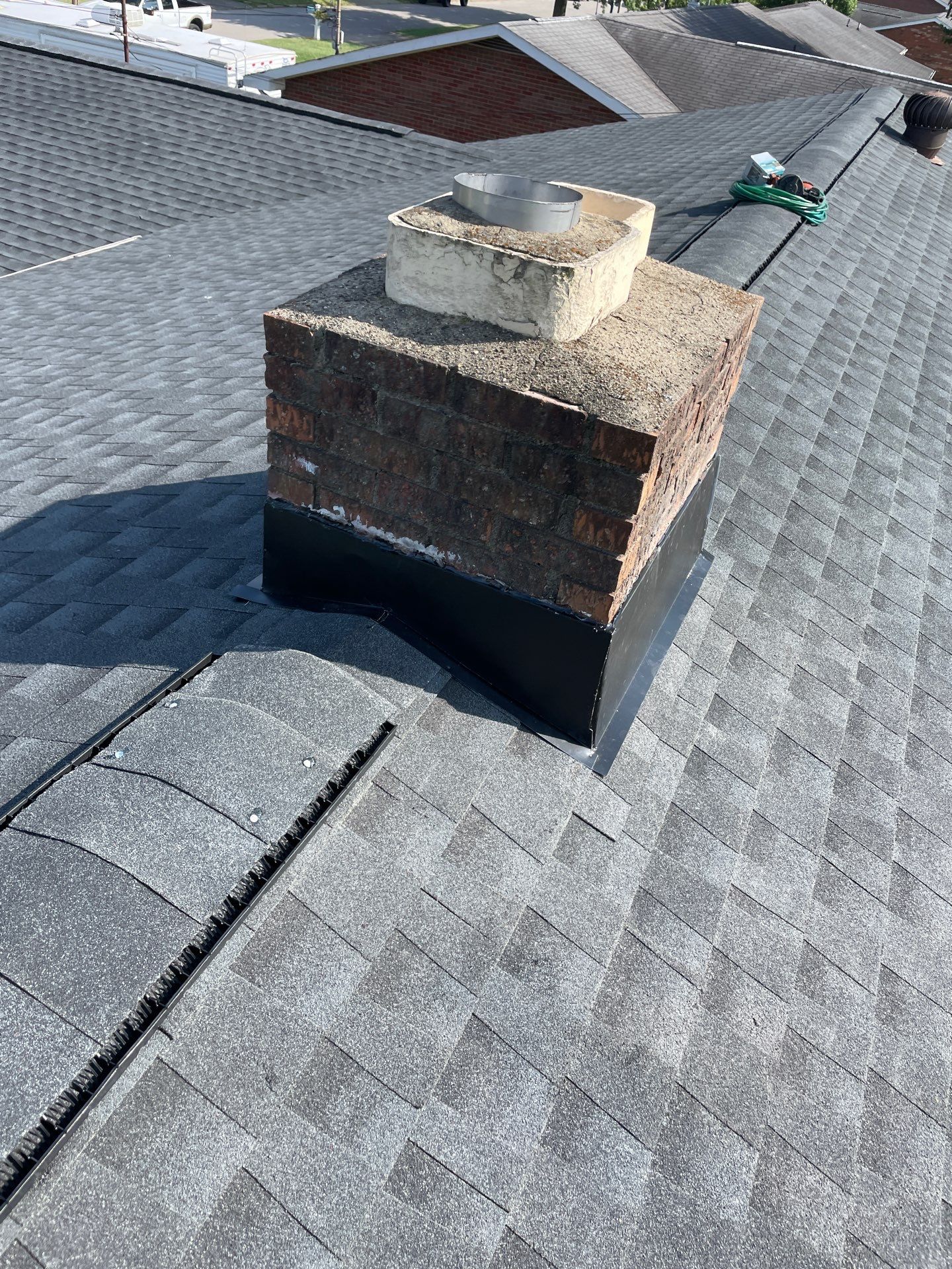 Residential Roofing Installation using GAF Timberline HDZ Charcoal by Rainstoppers Roofing