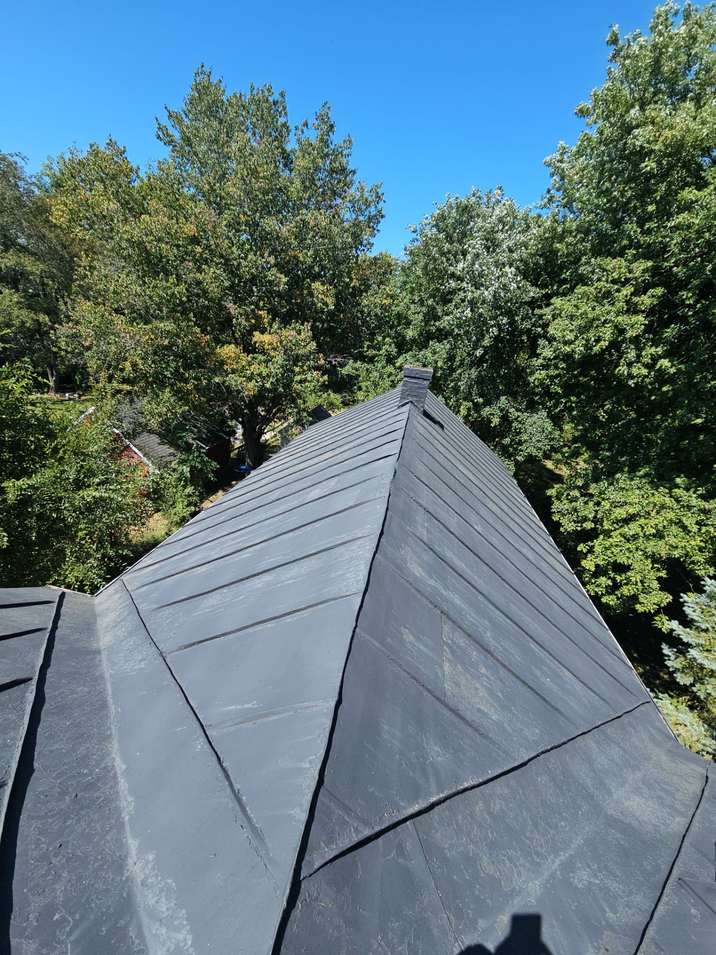 Metal Roof and Gutter Replacement by Winchester Roofing