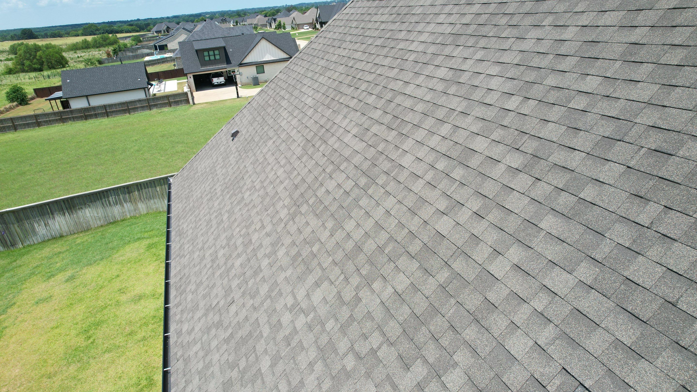 Architectural Shingle and Standing Seam Metal Roof Installation in Mount Selman by Sky High Roofing