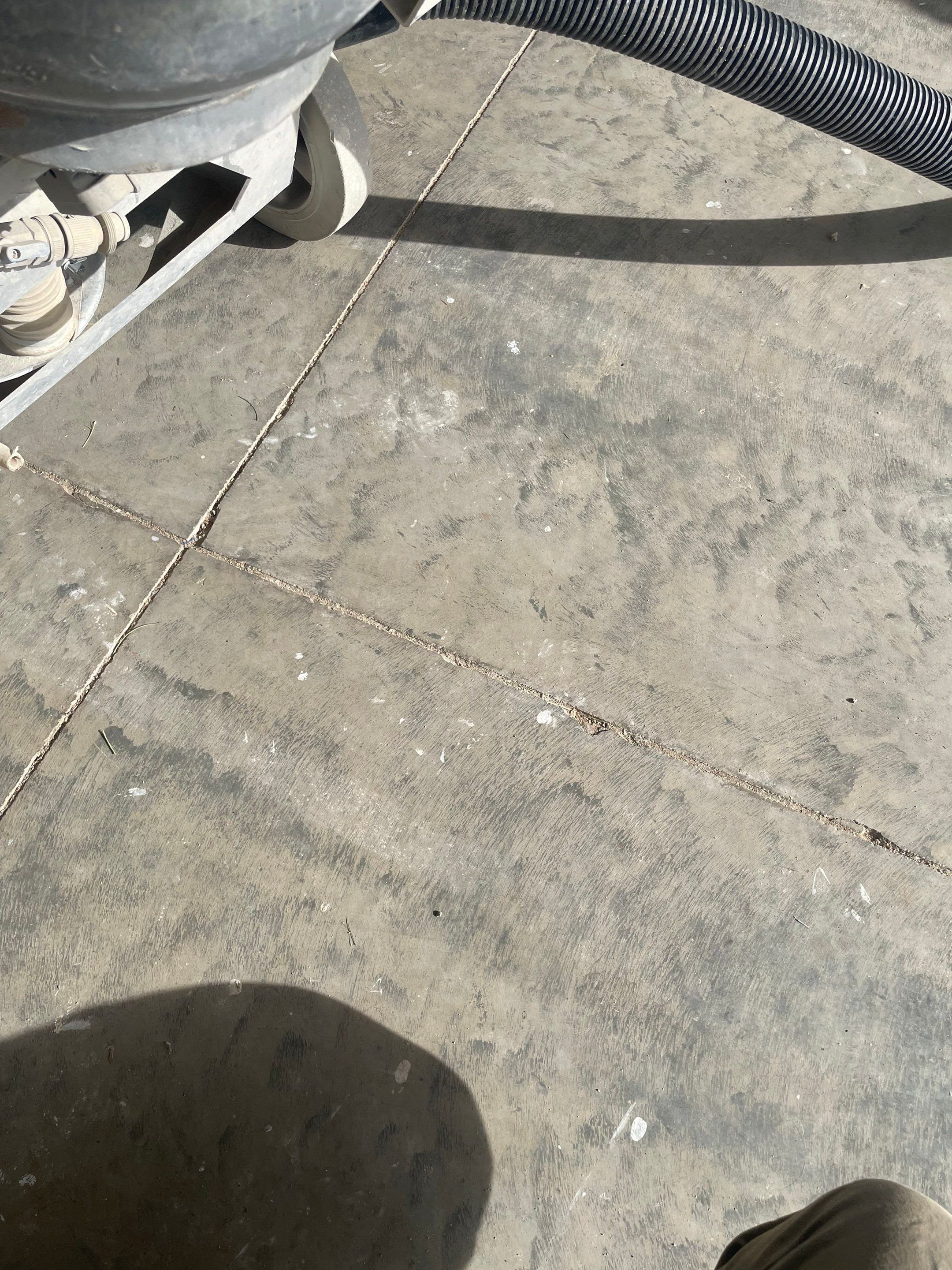 Sioux Falls Garage Floor Transformation with Cabin Fever Decorative Chips by Select Painting, Coatings & Garage Cabinets