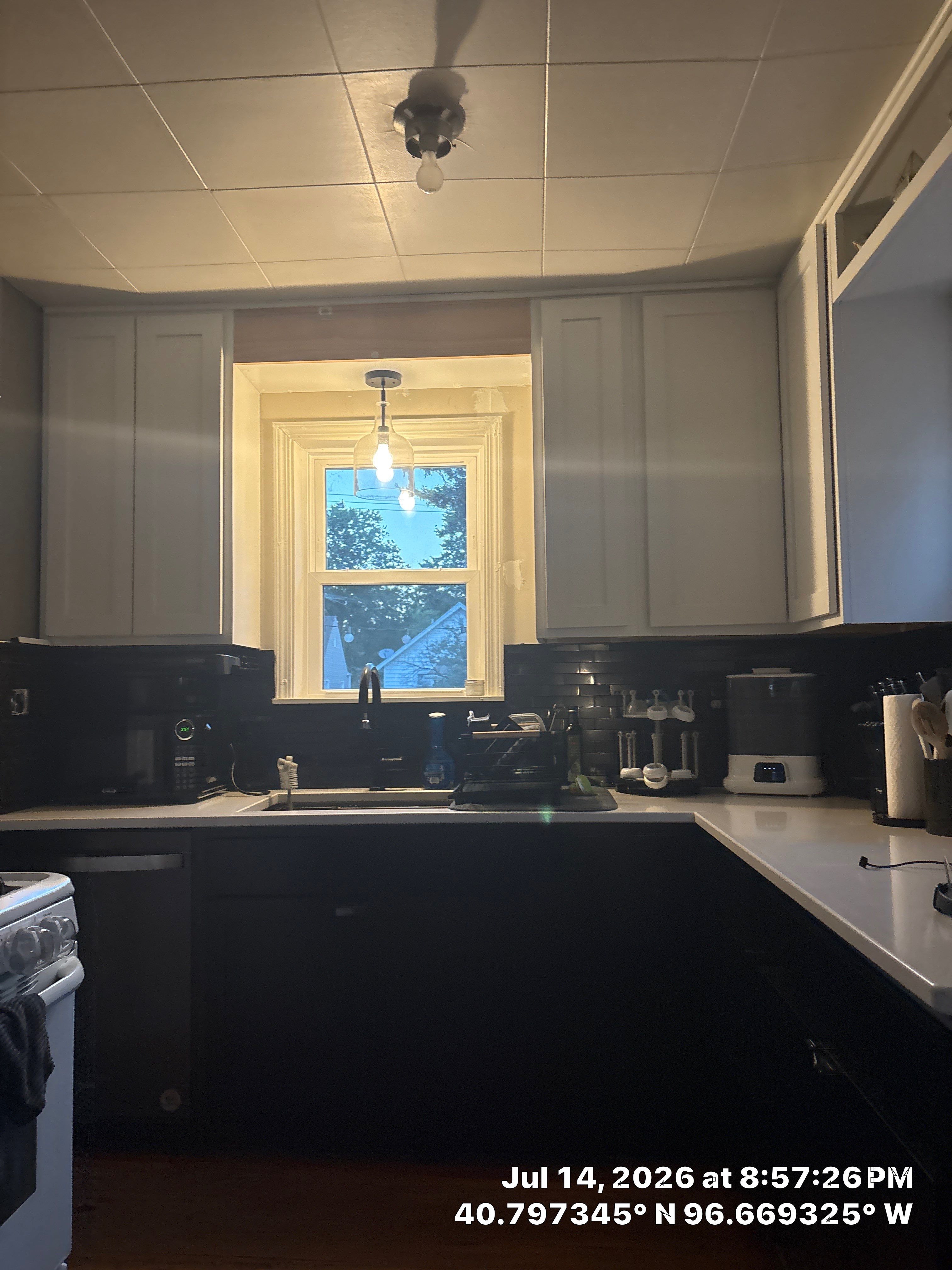Two-Tone Kitchen Remodel with Quartz Countertops in Lincoln by CompanyCam Sales Demo