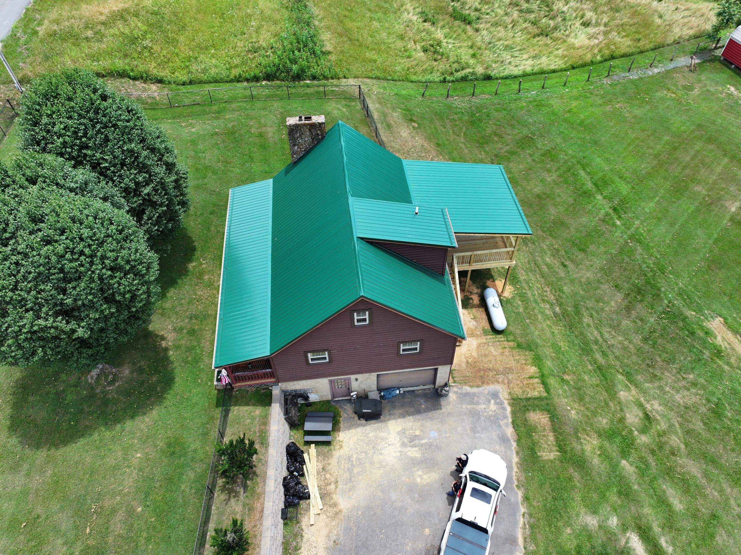 Paddle Creek Pet Ranch Cabin  by Omnia Roofing