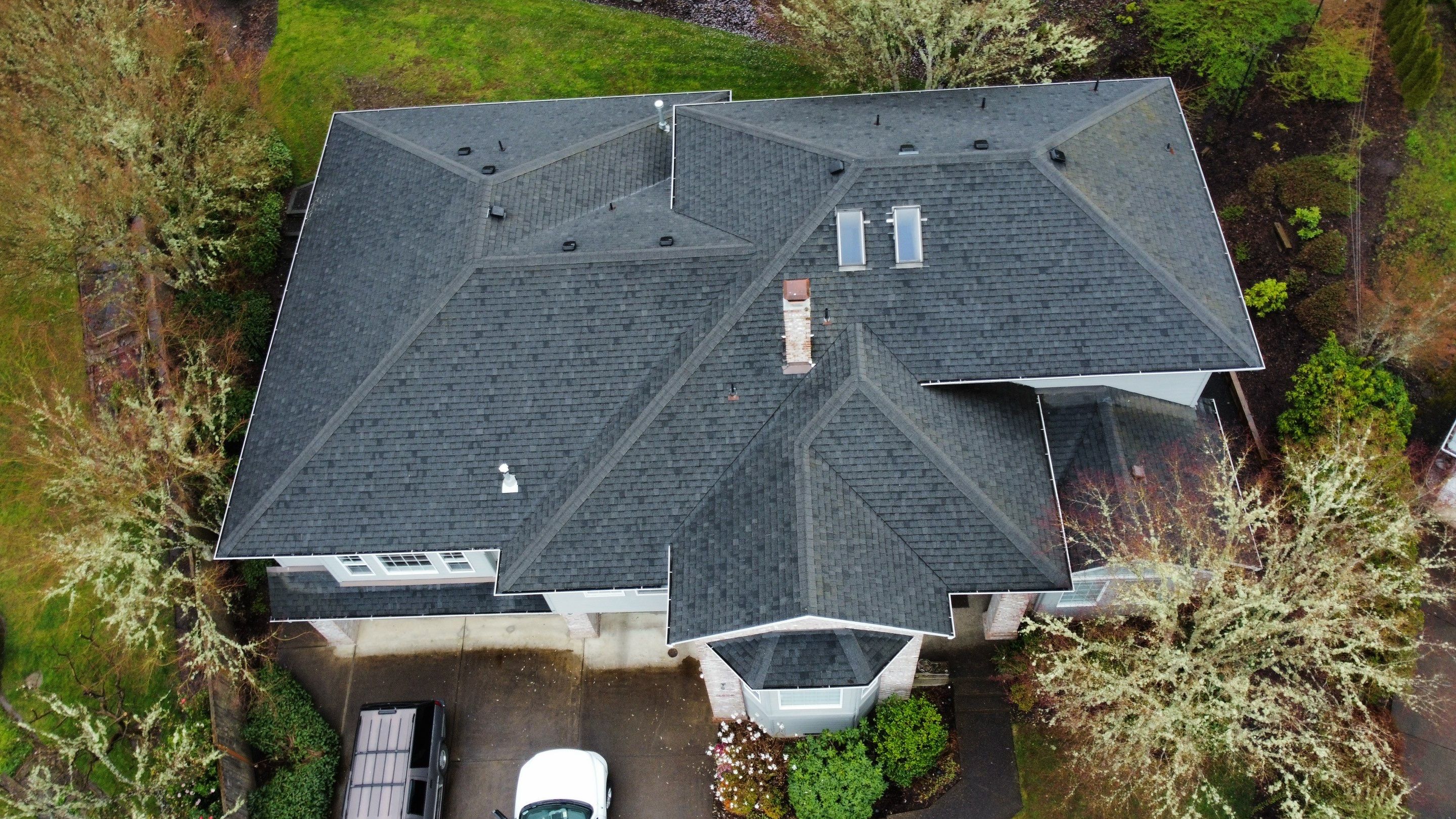Residential Roofing Installation using IKO Dynasty (Color: Granite Black) by Orezona Building & Roofing Company, Inc.