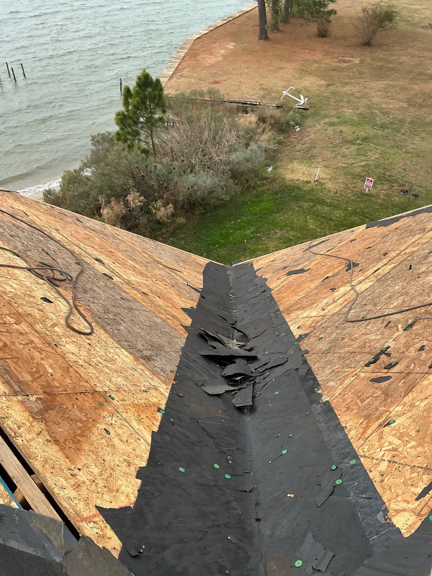 Waterfront Roof Replacement in White Stone, VA by Cade Construction