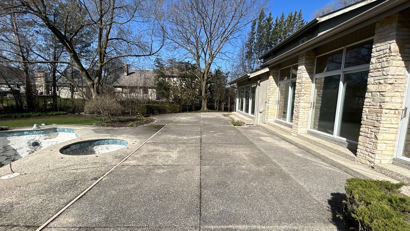 Aggregate Clean and seal using low gloss sealer by Northern Power Washing LLC.
