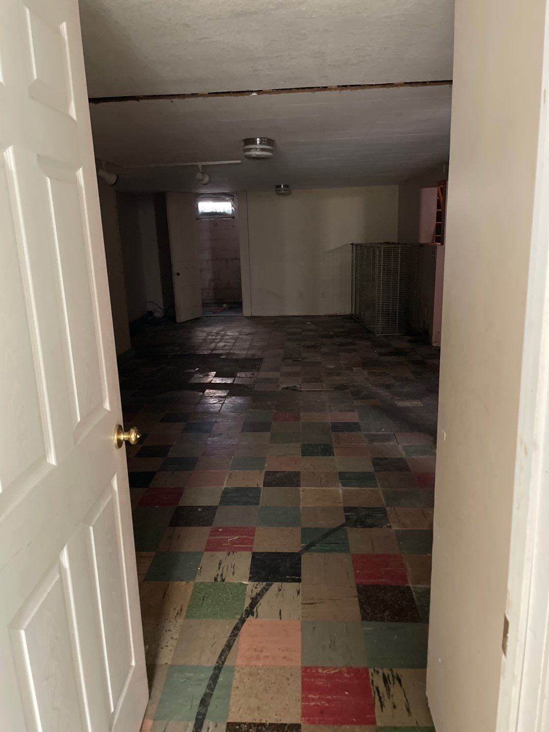 Interior drain tile system installation by ACE Waterproofing & Basement Solutions