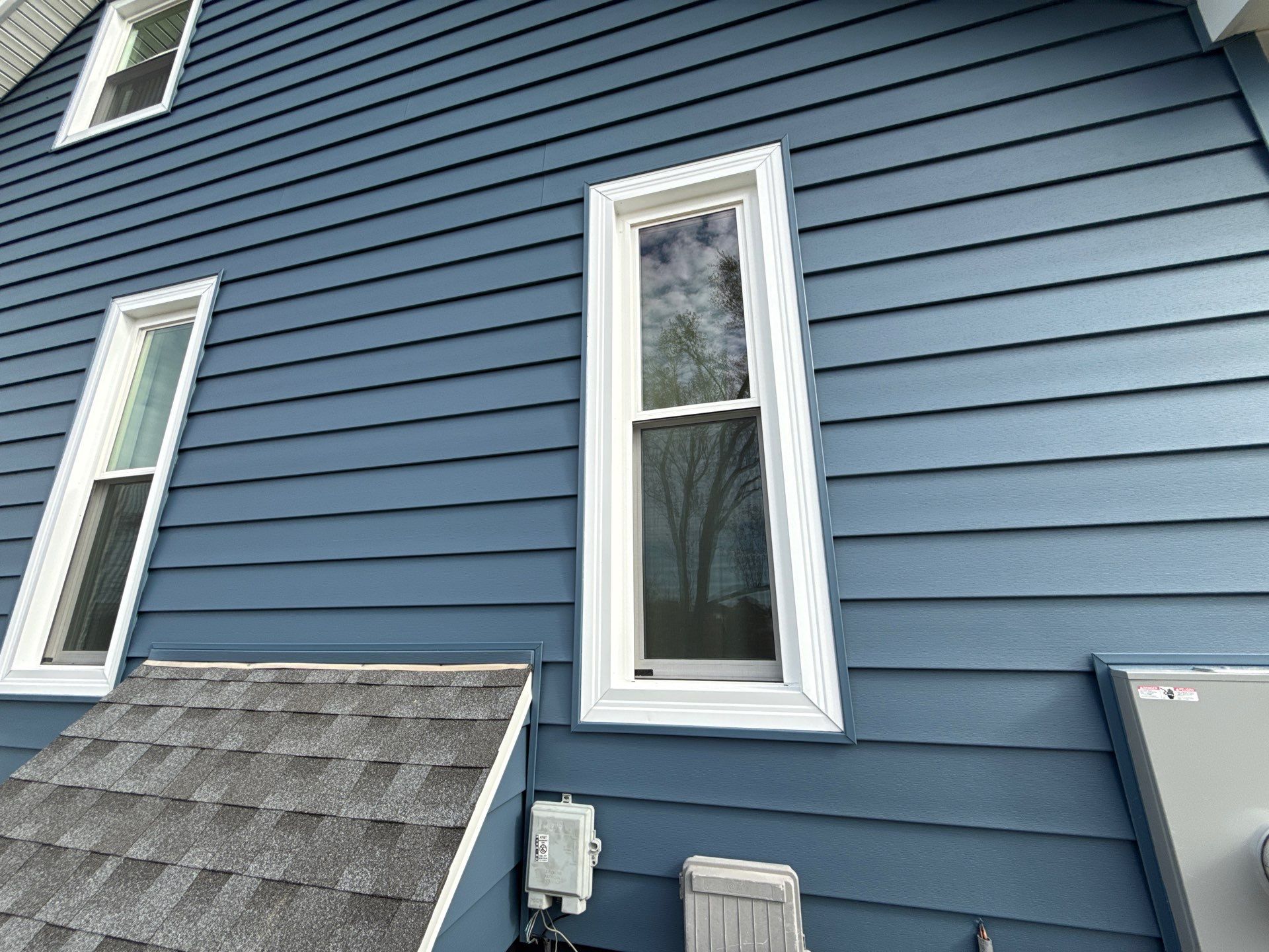Out with the Old , in with the Blue  by EEC  Windows, Siding & Roofing 