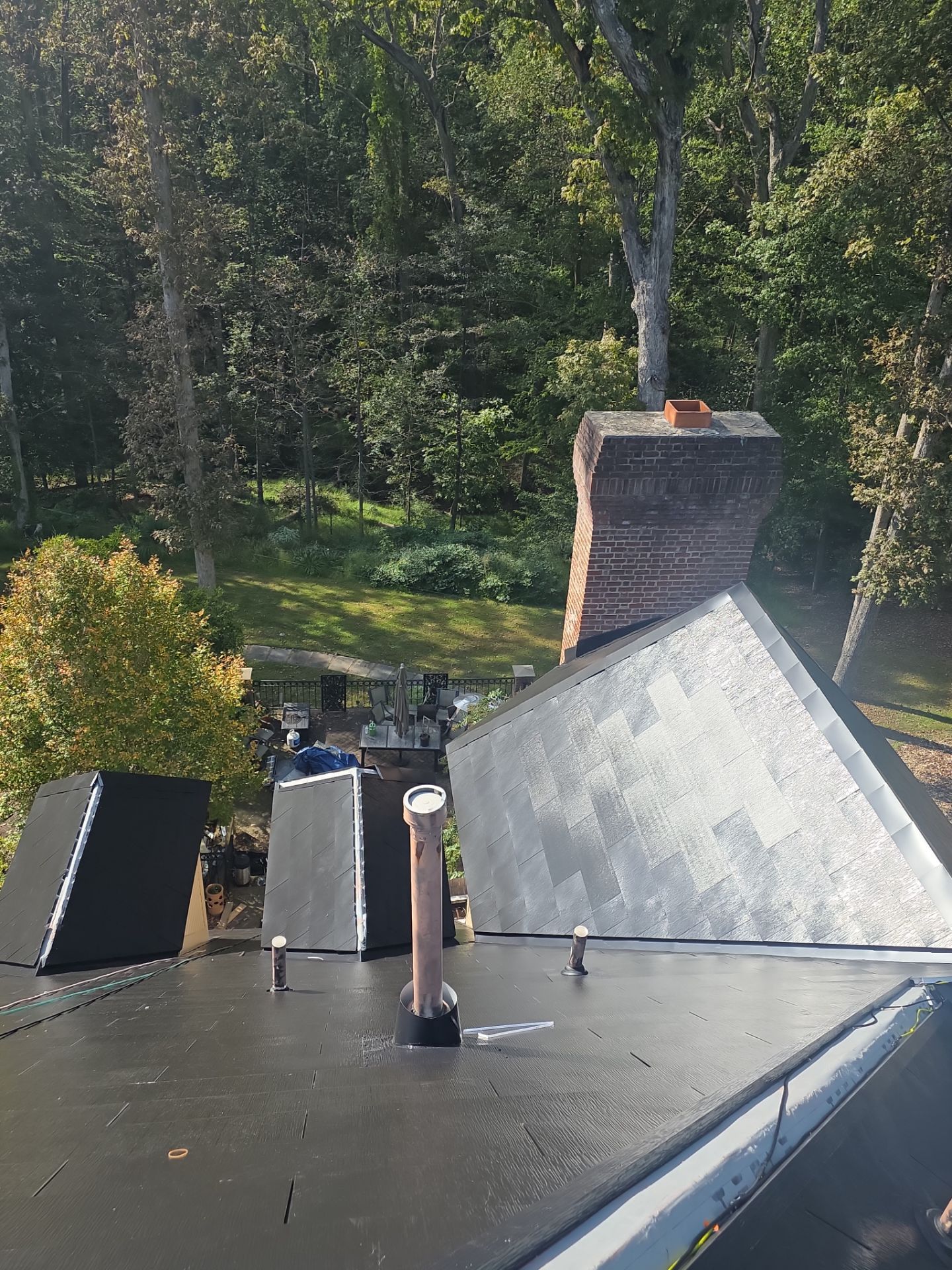Extravagant Tesla Solar Roof in Maryland by American Home Contractors