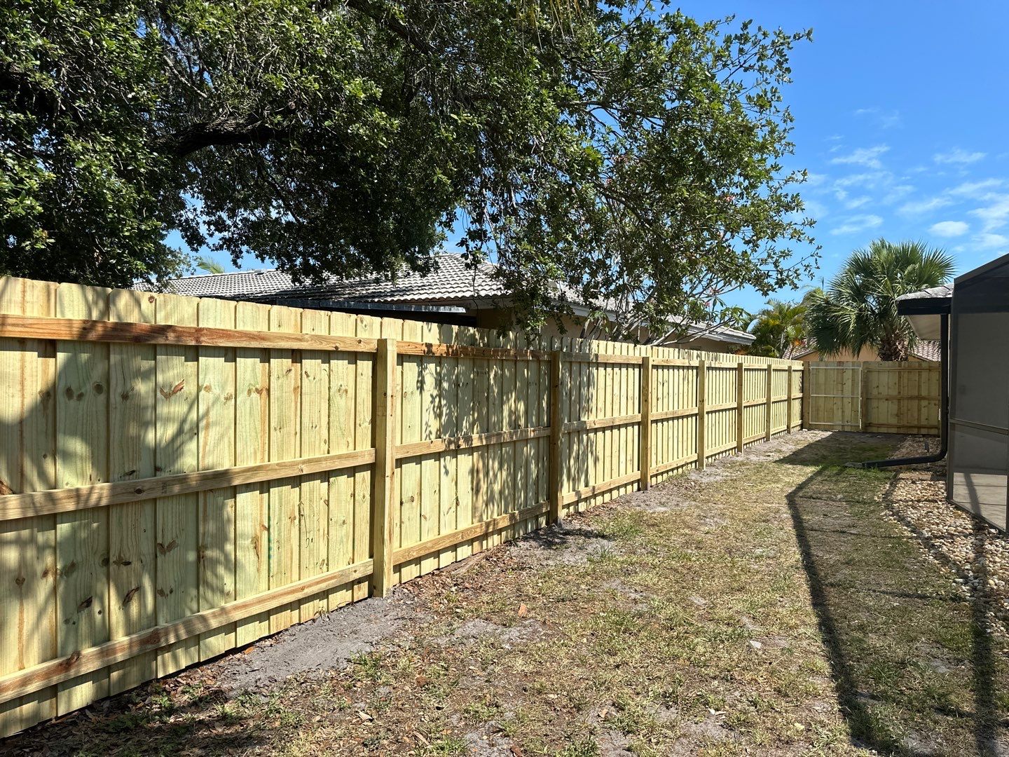 Wood Fence Installation using Wood Board on Board Fence by Asap fence and gates, LLC