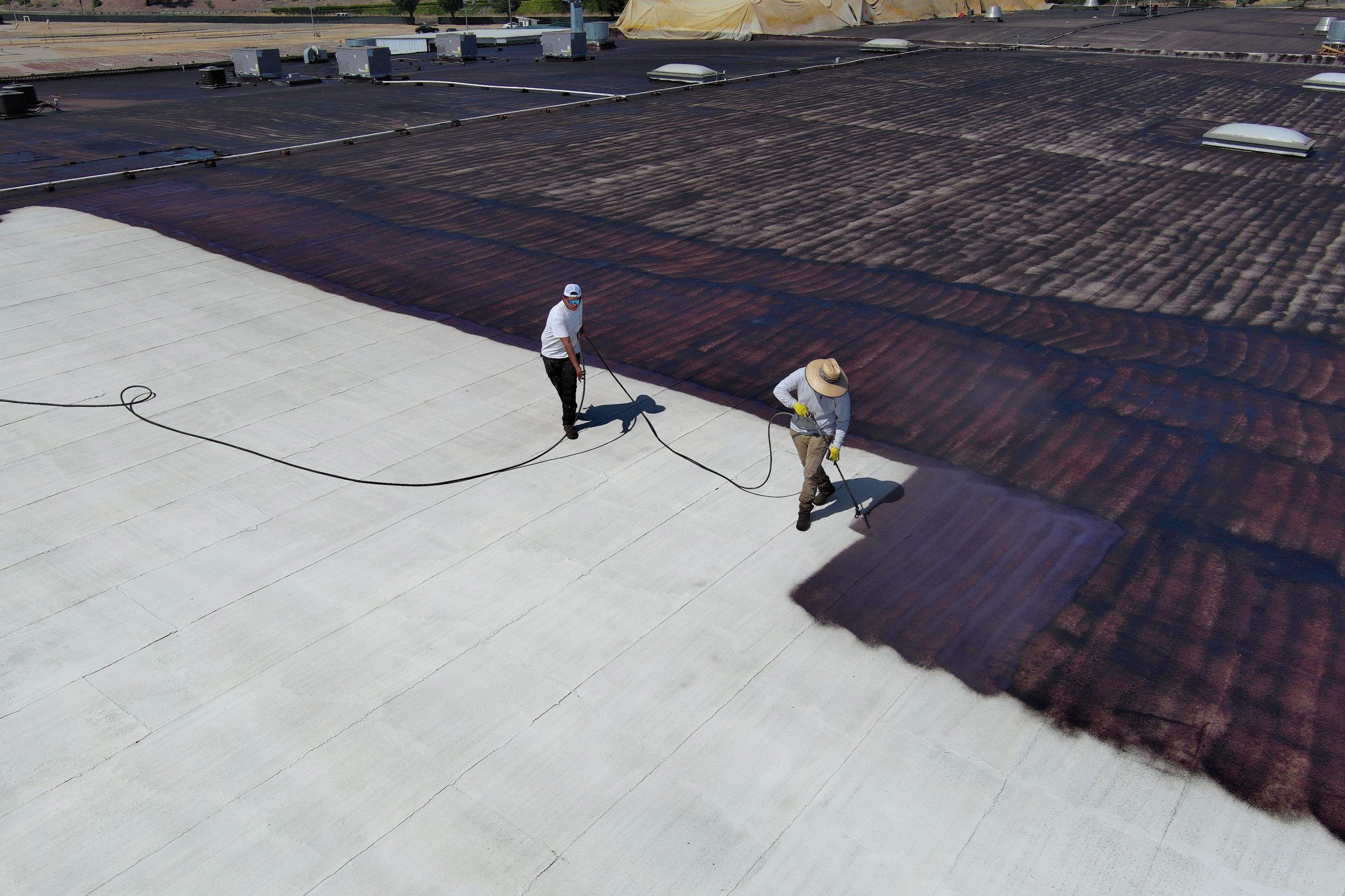 Pro Farms Spray foam roofing project by Straight Edge Roofing Inc