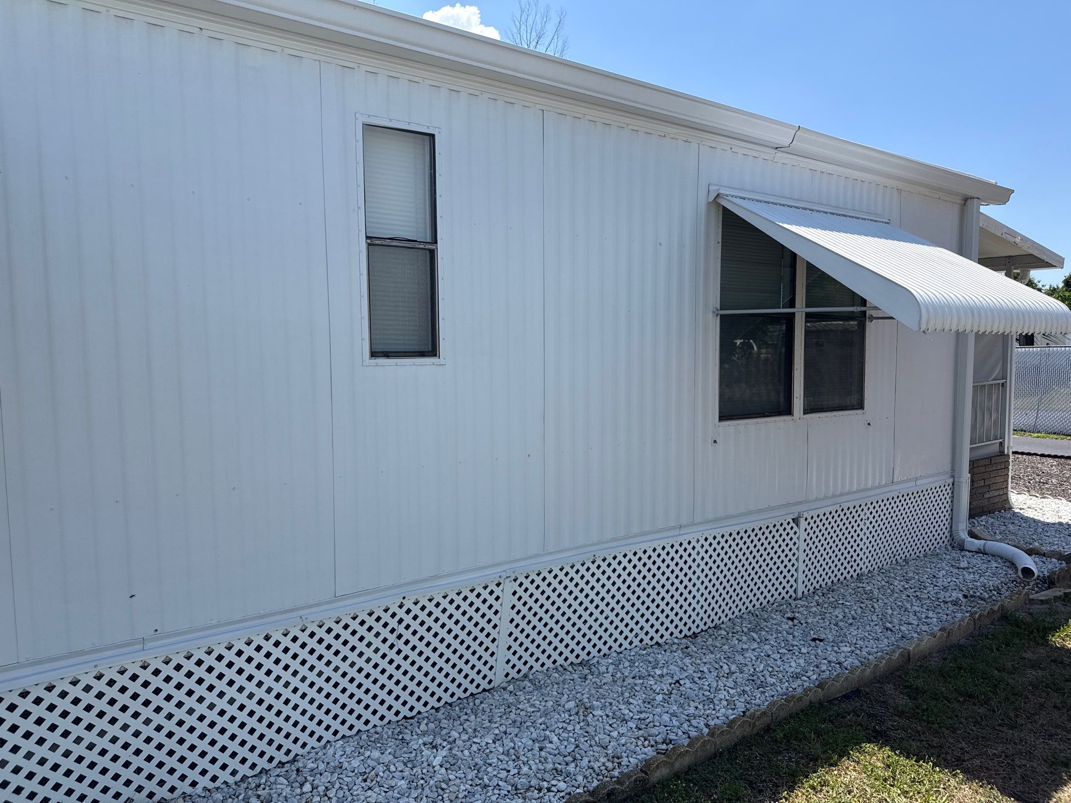 Mobile Home Soft Wash & TPO Roof Cleaning in Plaza Estates – Bradenton, FL by Sunshine AquaWash