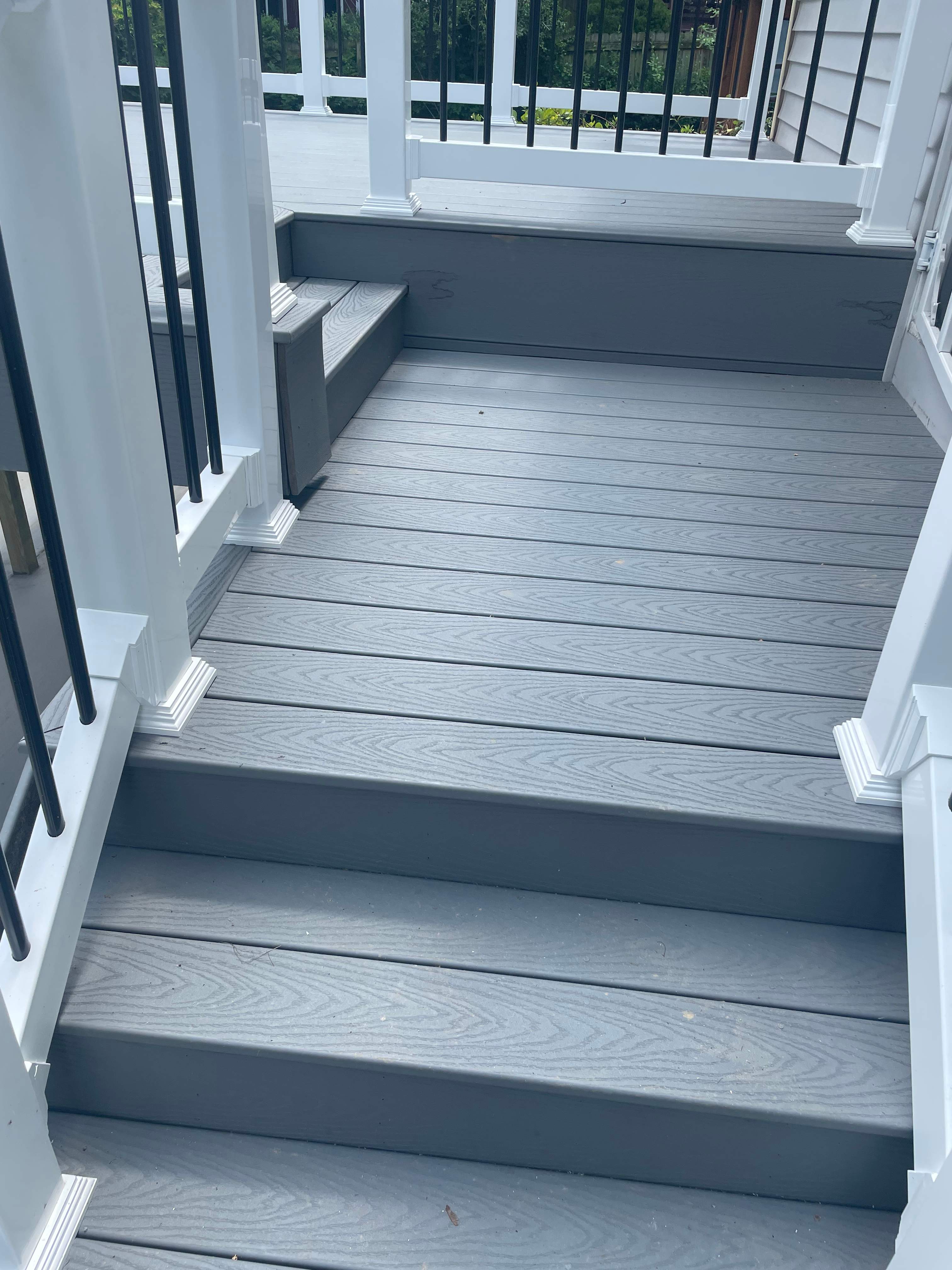 Deck resurfacing, railing replacement and concrete resurfacing by Fairfax Contractors, LLC