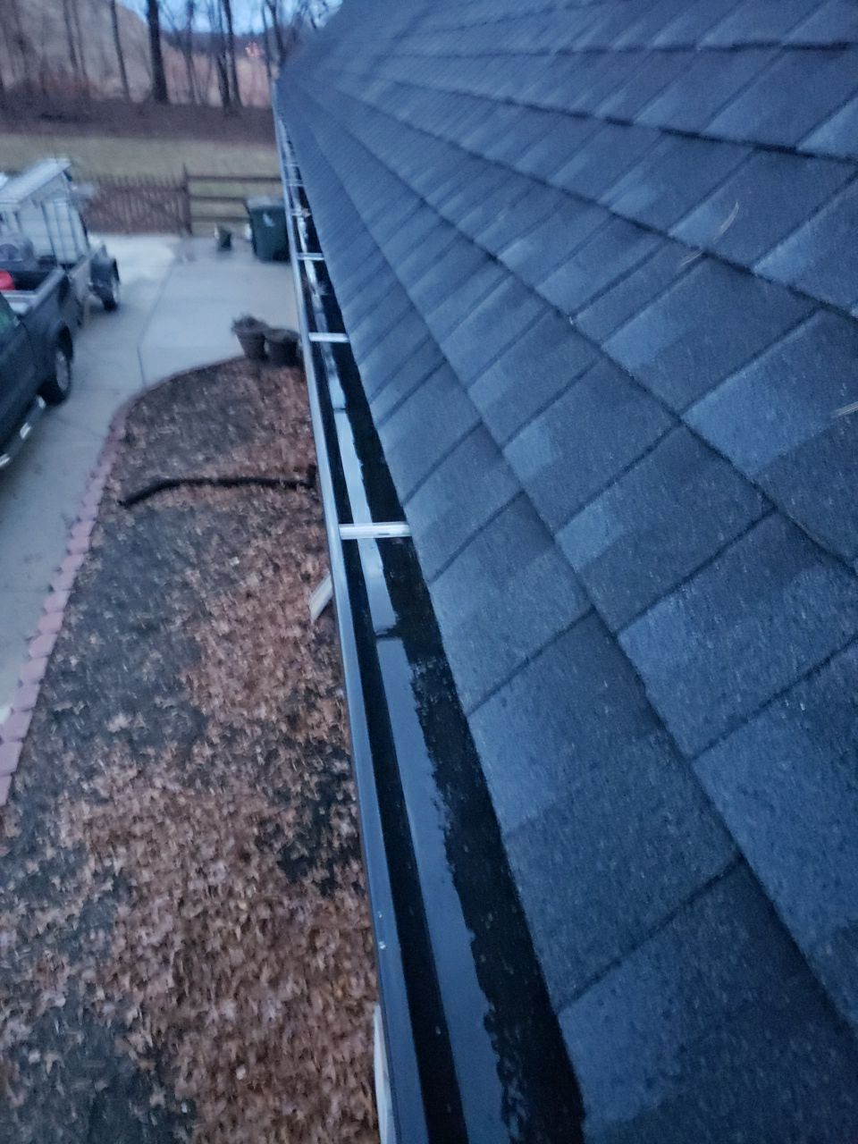 Gutter Cleaning using water by Power Wash Masters LLC