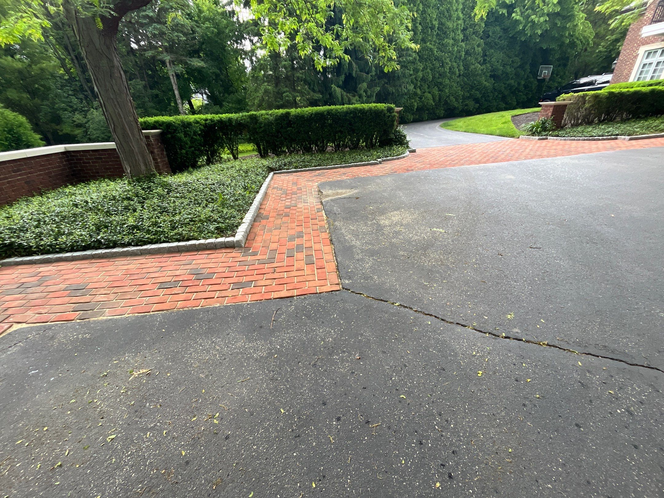 Brick paver clean, sand and seal.  using Algaecide, soft wash soap by Northern Power Washing LLC.