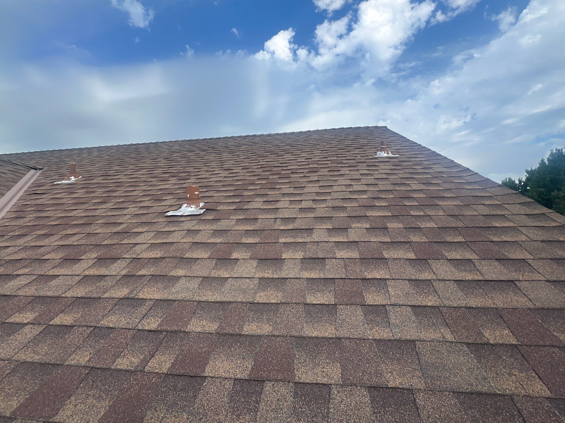 Hail Damage Roof Inspection in Oklahoma City, OK by McCann's Roofing and Construction