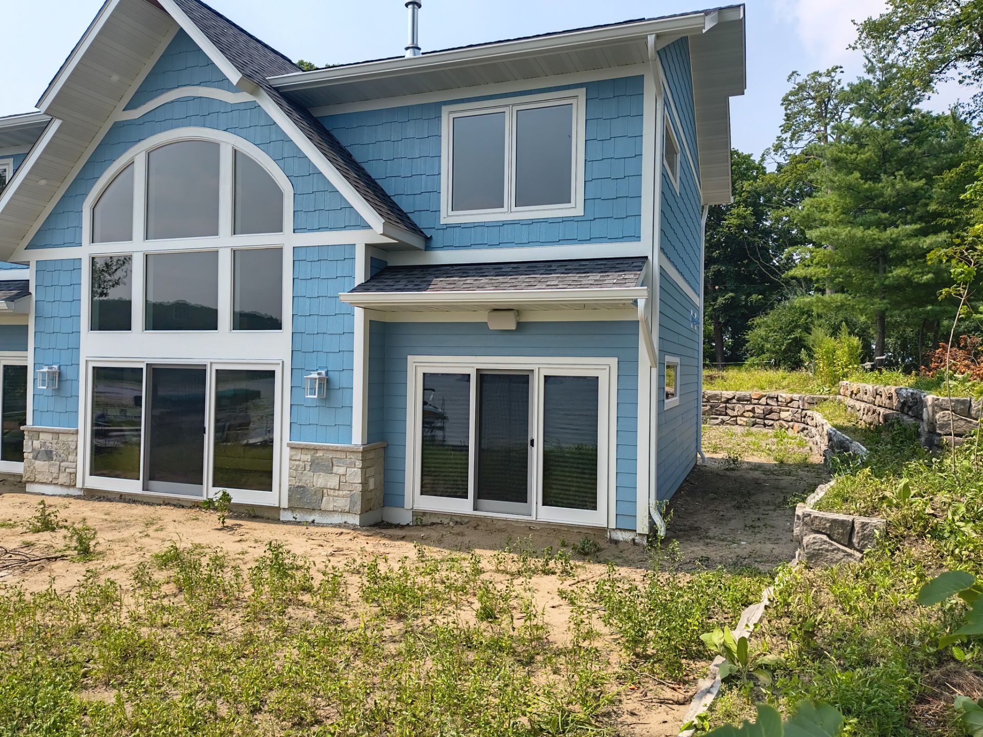 White Seamless Gutters in Maple Lake, MN by Next Level Seamless Gutters / Exteriors Inc.