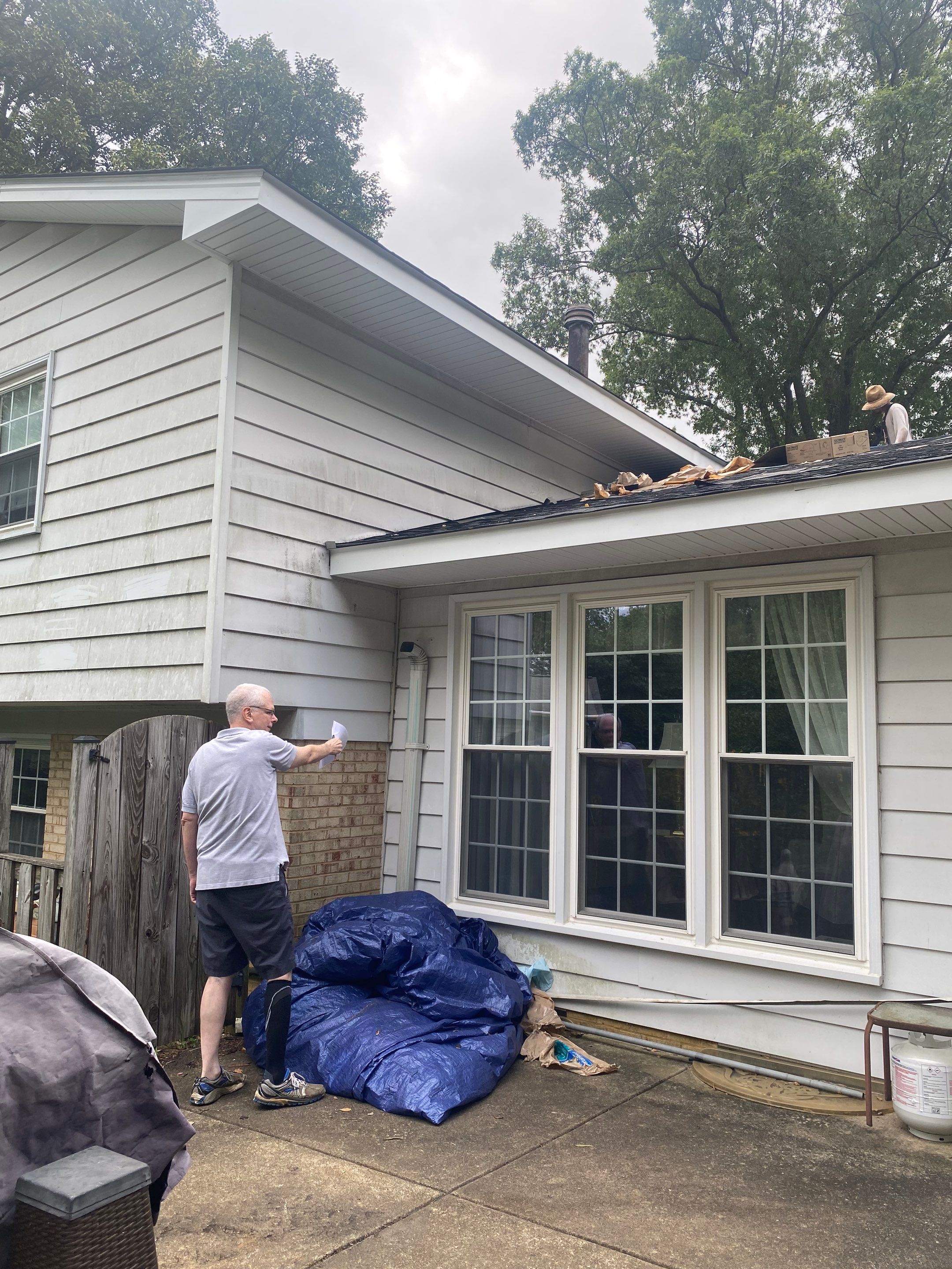 Vienna: Multi-Trade Restoration with CertainTeed Landmark Shingles in Charcoal Black by RM Banning, Inc.