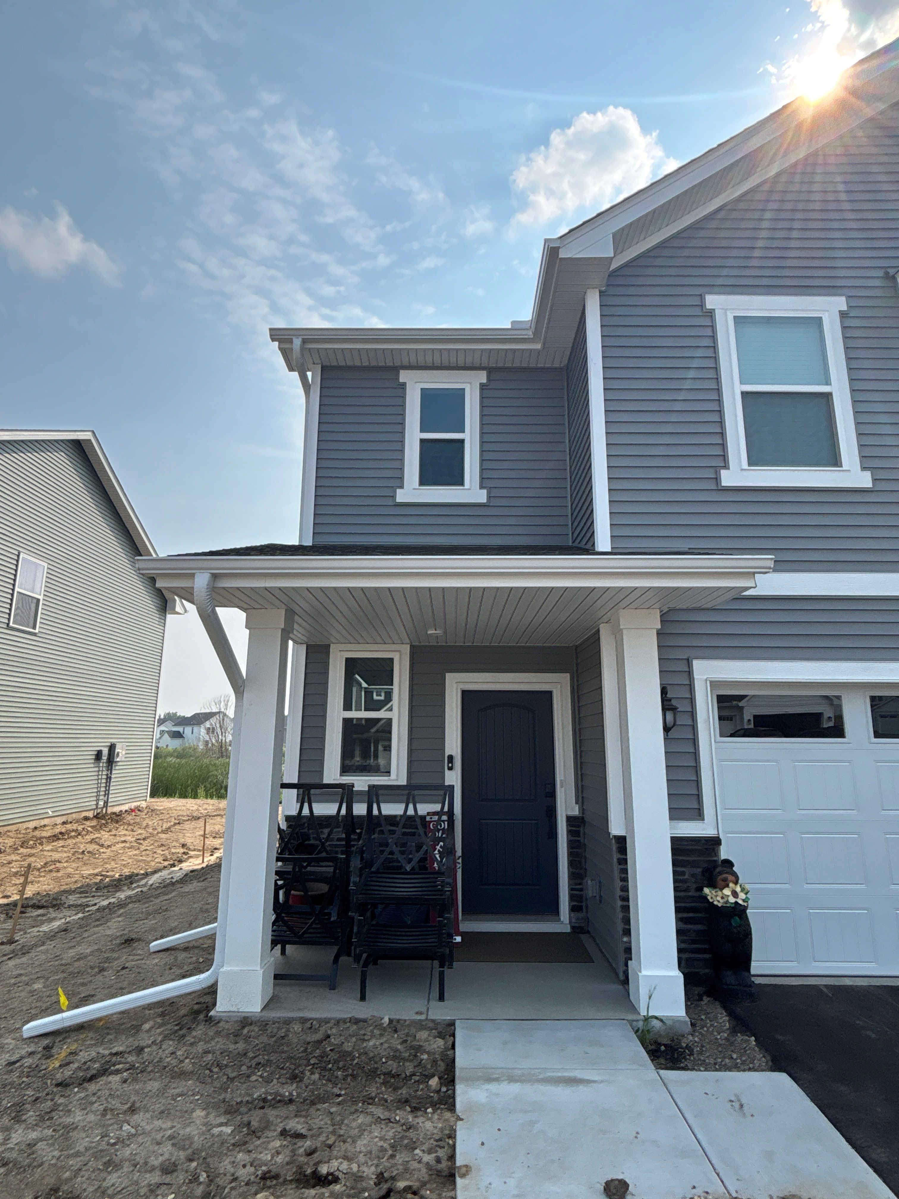 5-Inch White Seamless Gutter Installation – Otsego, MN by Next Level Seamless Gutters / Exteriors Inc.
