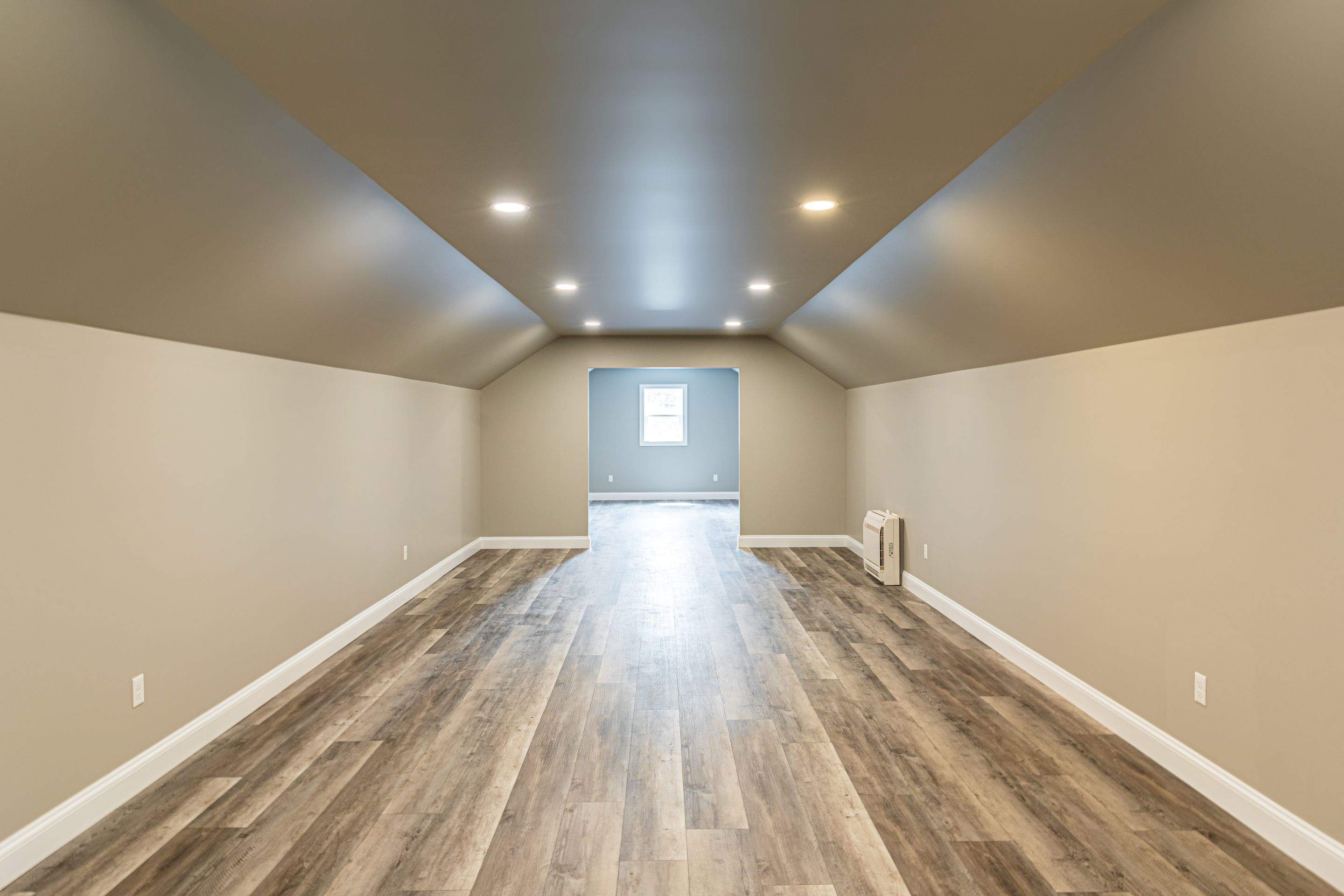 Custom Two-Story Garage with Finished Upper Leve by Esh Builders