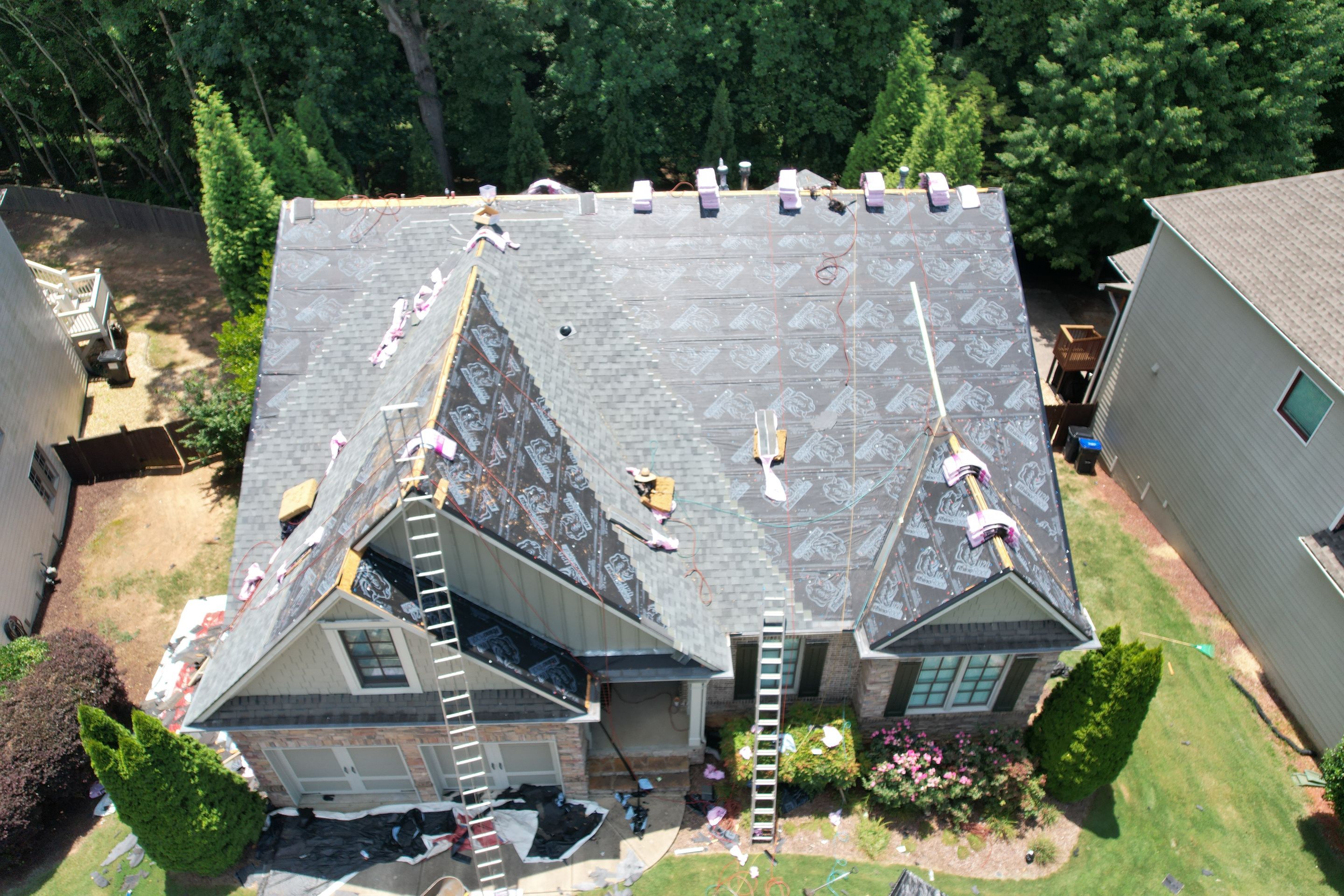Residential Roofing Installation using Owens Corning Quary Gray by Inspector Roofing and Restoration