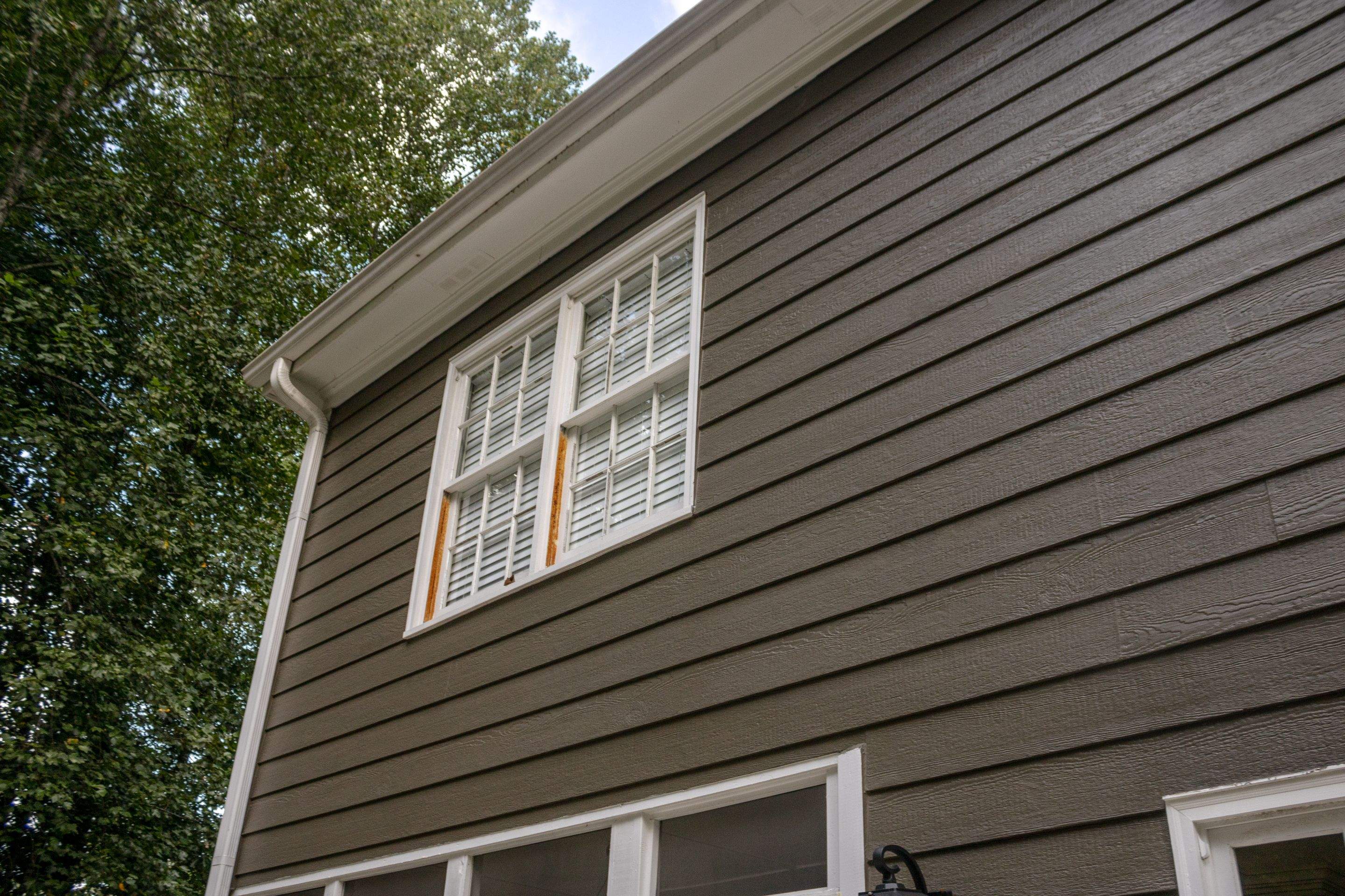 Marietta, GA Full Siding Replacement, 30+ Window Replacements, Screened-In Porch to Sunroom Conversion, Gutter Replacement, and Exterior Painting by Nelson Exteriors