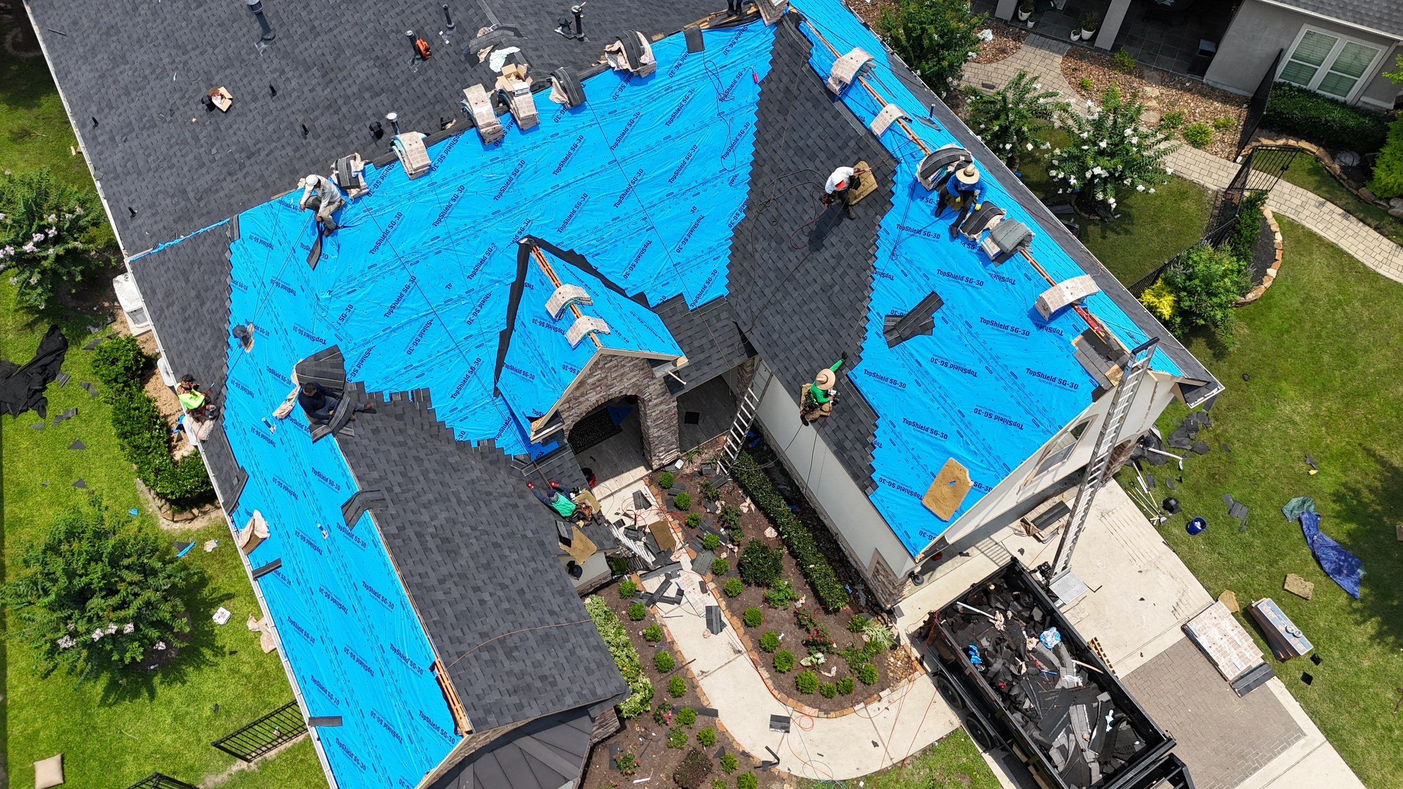 Residential Roofing Installation using Certainteed Landmark after last year's tornado in Cypress by Core Four Roofing