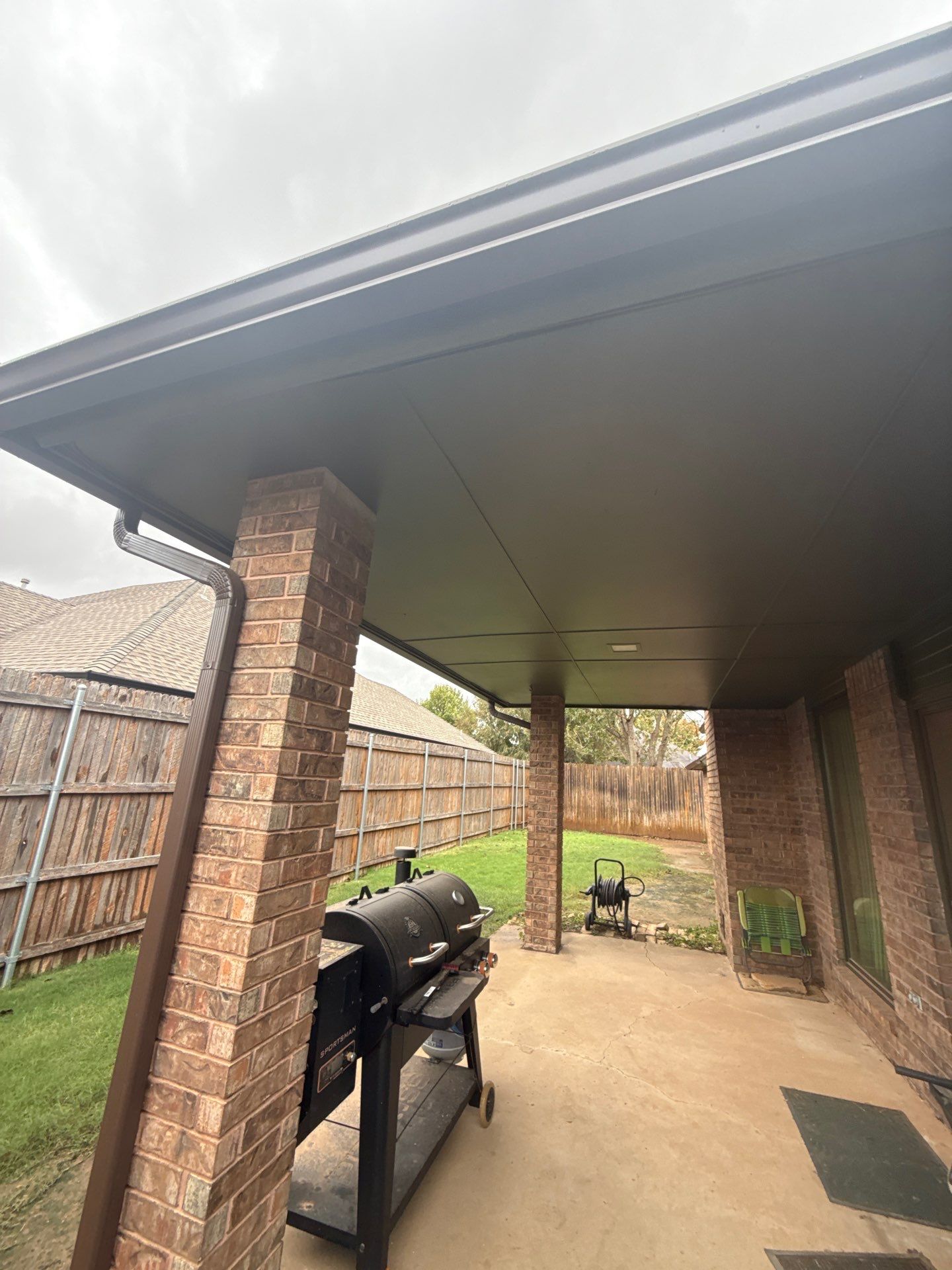 Gutter installations and exterior painting by McCann's Roofing and Construction