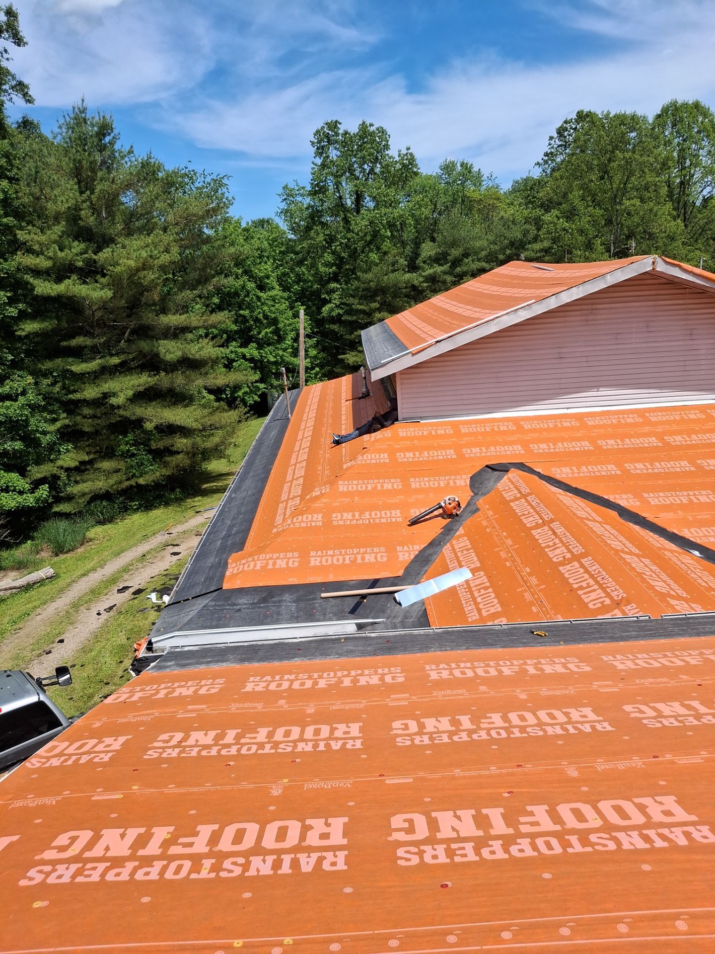 Residential Roofing Installation using GAF Timberline HDZ Charcoal by Rainstoppers Roofing