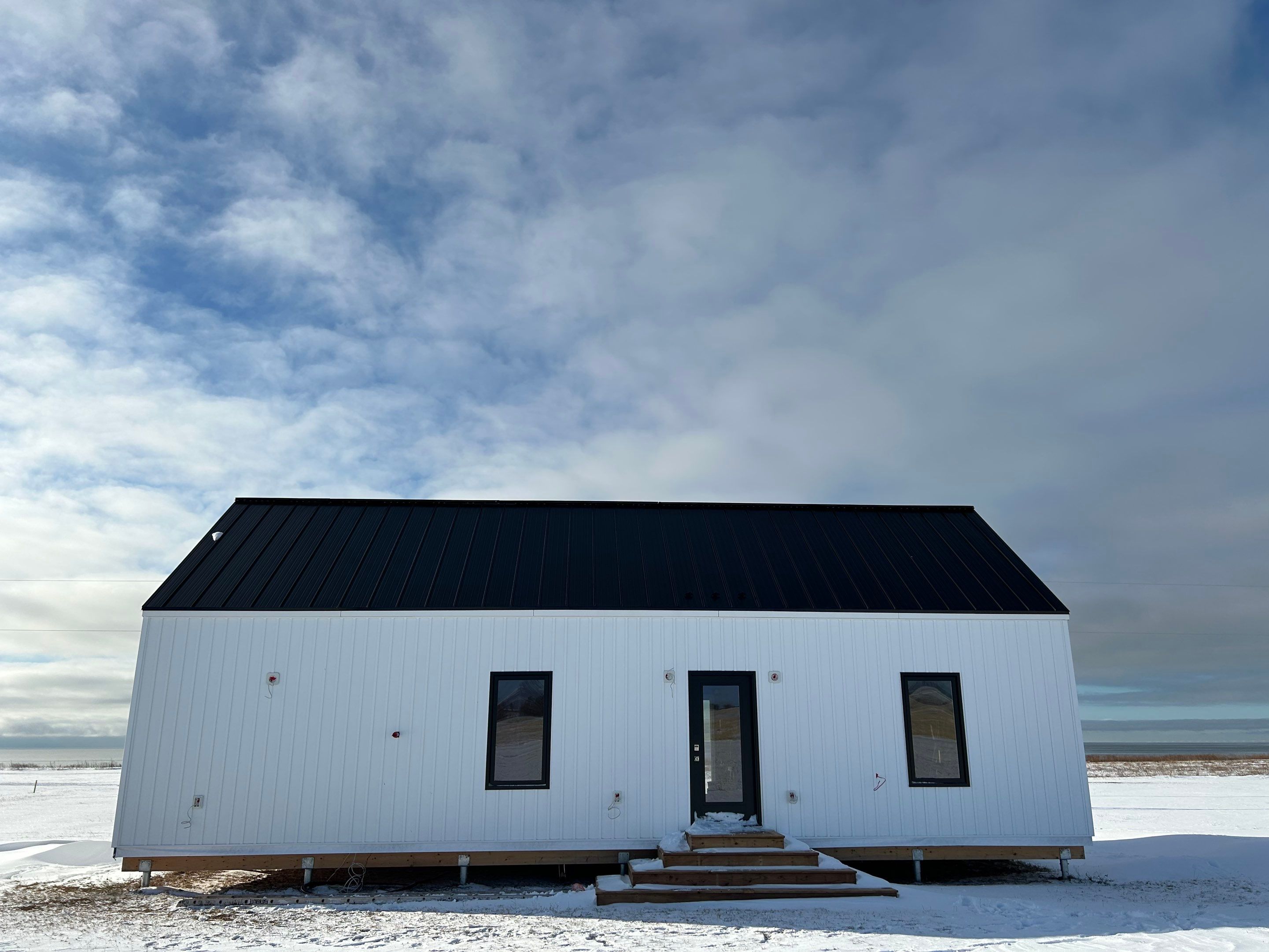 Residential Roofing Installation using Standing Seam Steel by Artisan Roofing & Home Improvements Inc.
