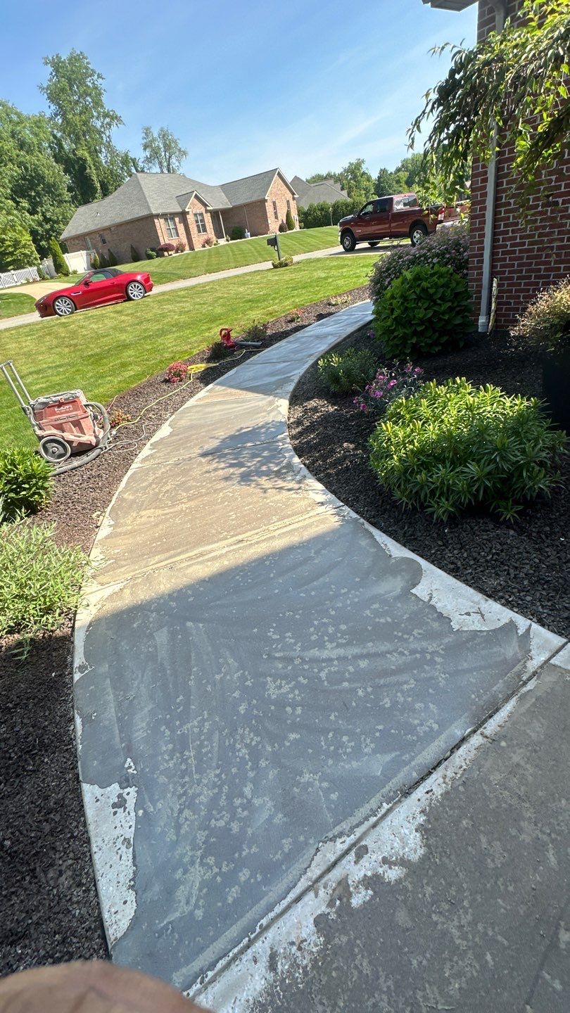 Driveway + Garage + Walkway Project in Meridian by Floors in a Day, Inc