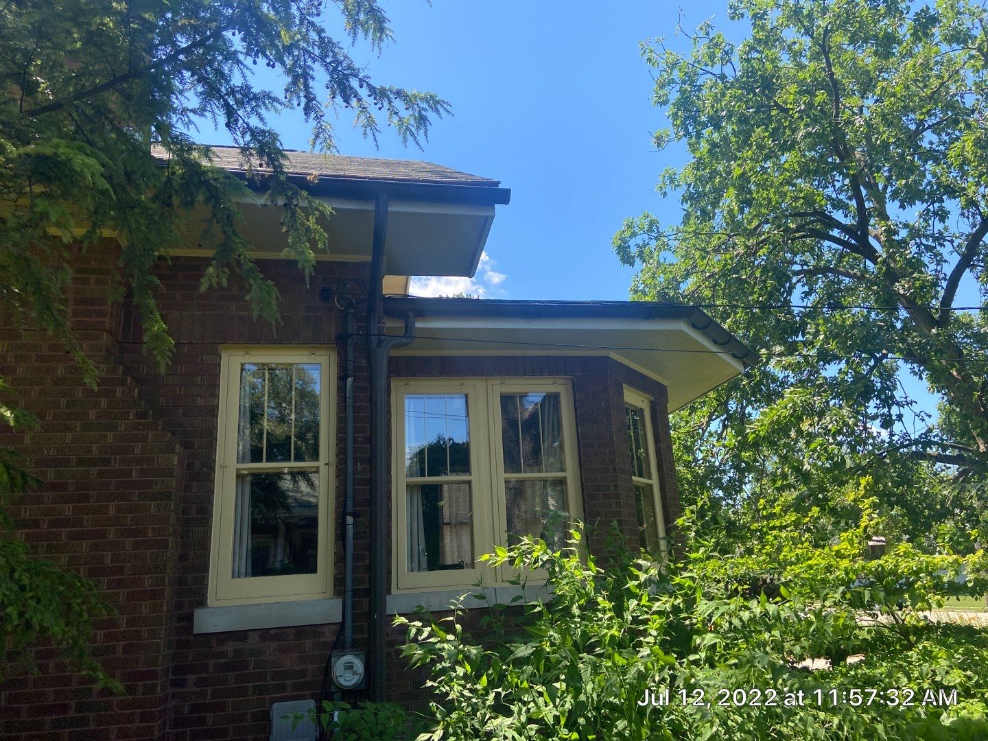 Asphalt Shingle Replacement and Half Round Copper Gutters Installation by Custom Installations, Inc.