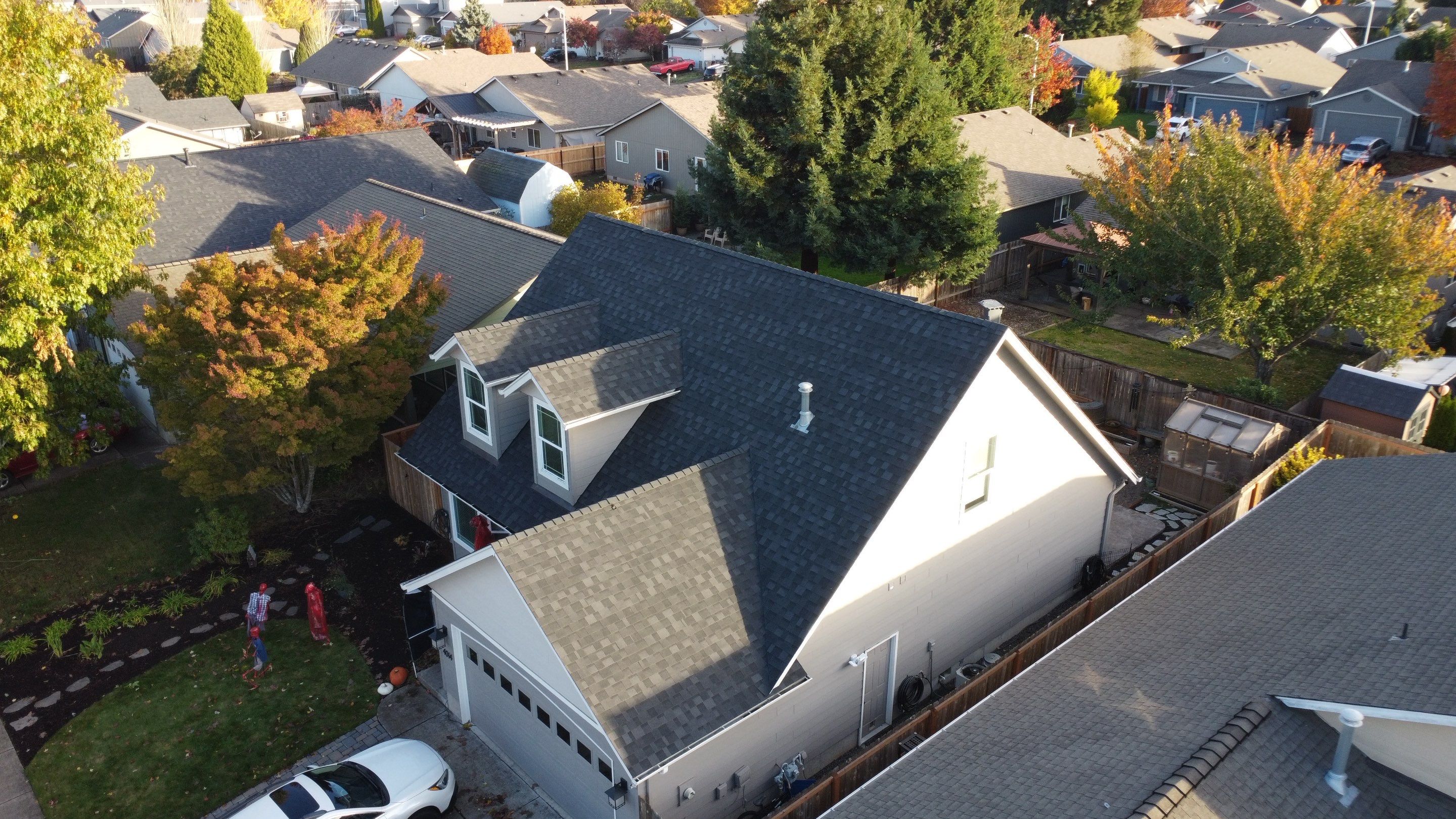 Granite Black Residential Roof Replacement by Orezona Building & Roofing Company, Inc.