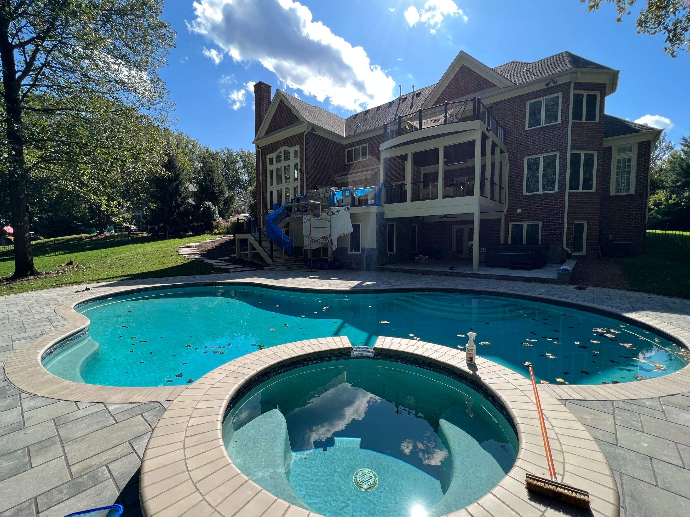 Custom Multi-Level Deck, Outdoor Kitchen & Pool Patio in McLean, VA by Sunburst Construction Inc