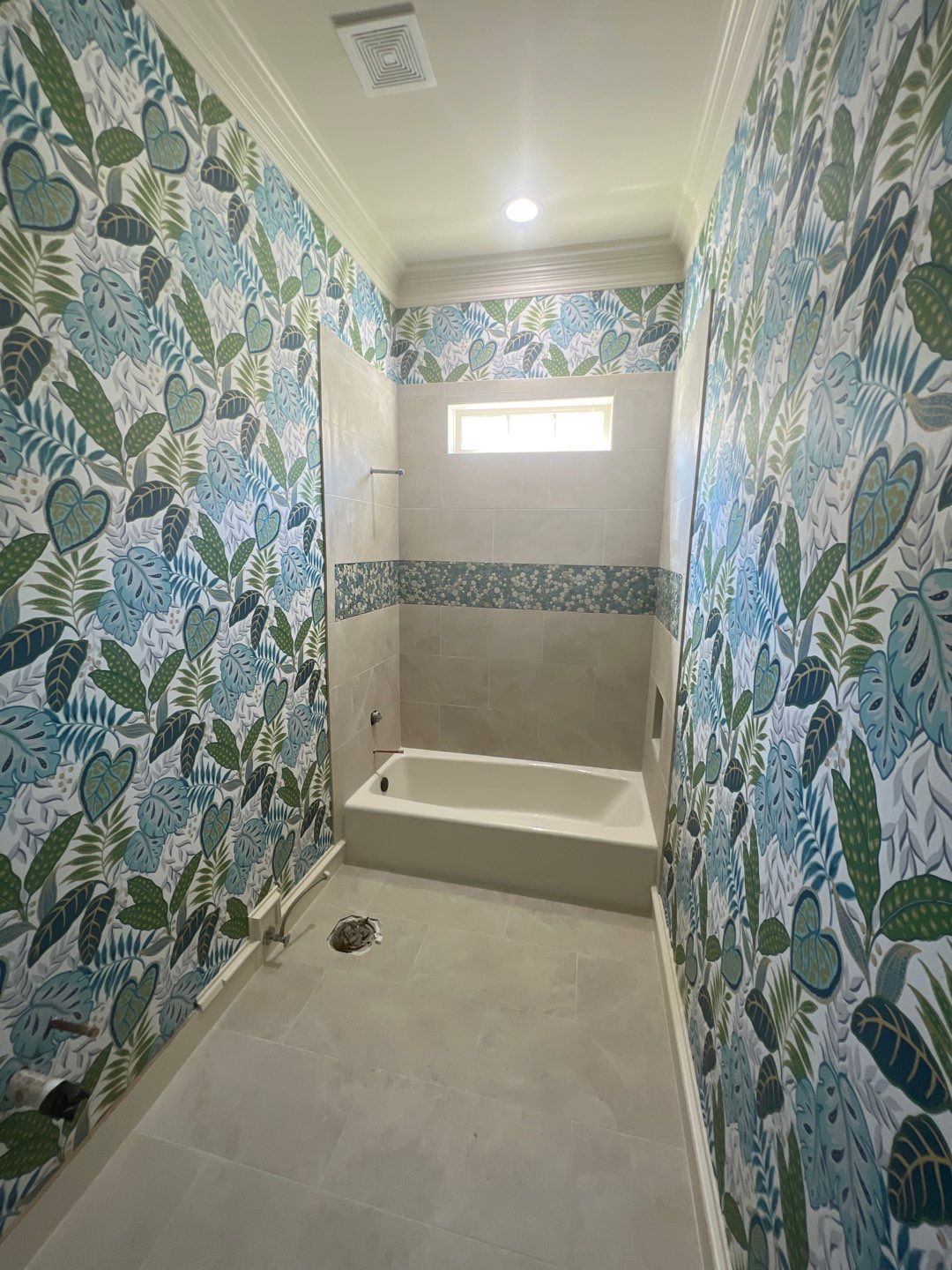 Wallpaper Installation in the Bathroom by Nomad Painting