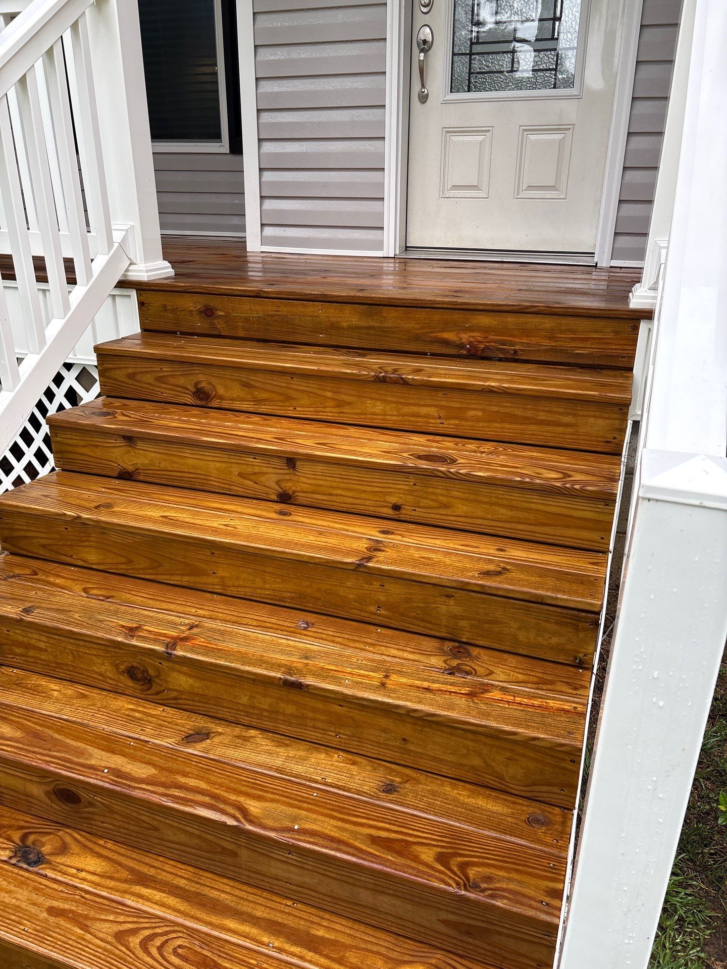 Wood Deck and Concrete Walkway using Wood and Concrete Sealant by DuraSeal