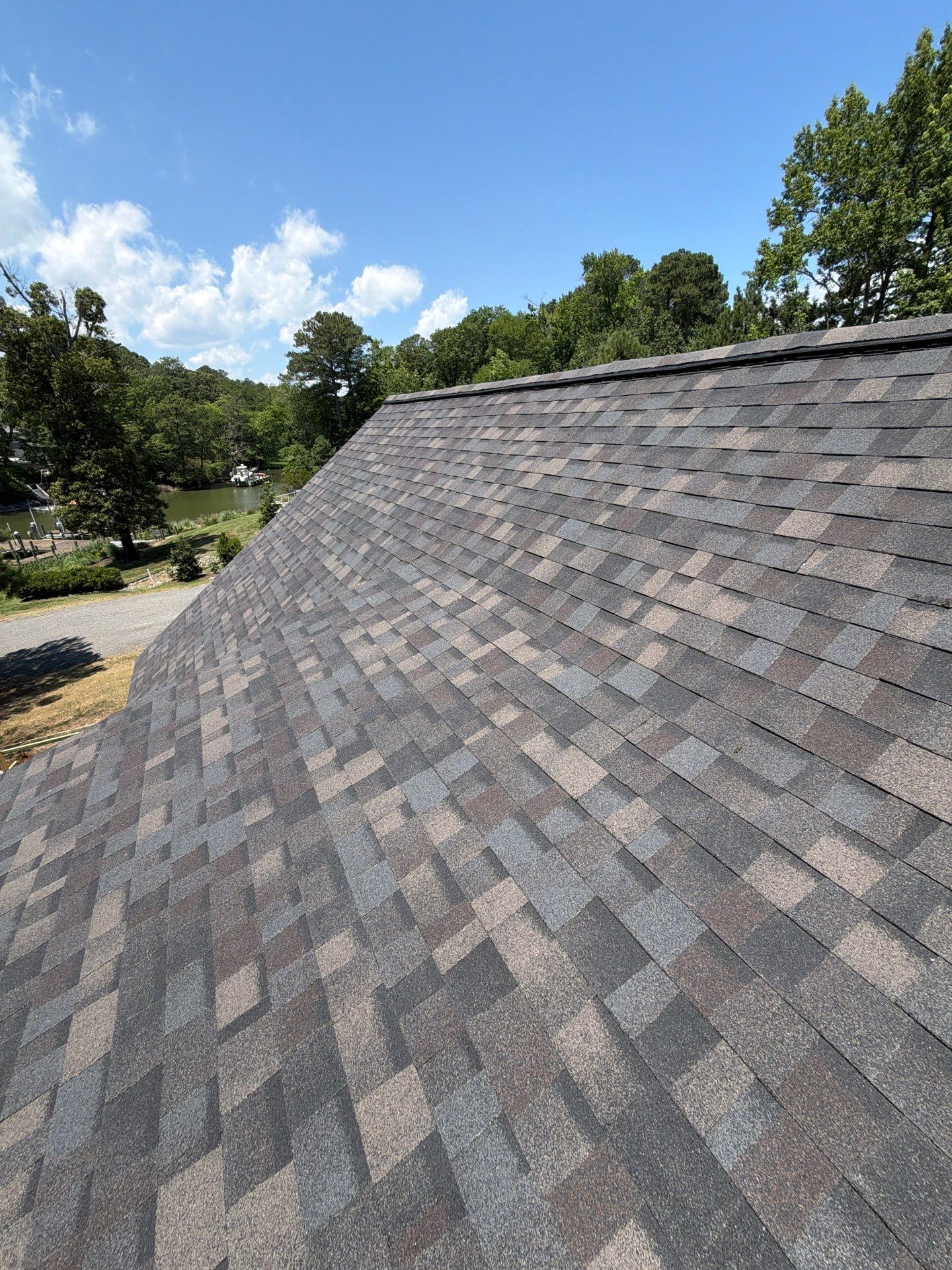 Complete Asphalt Shingle Roof Replacement and Sheathing Repair in Deltaville by Cade Construction