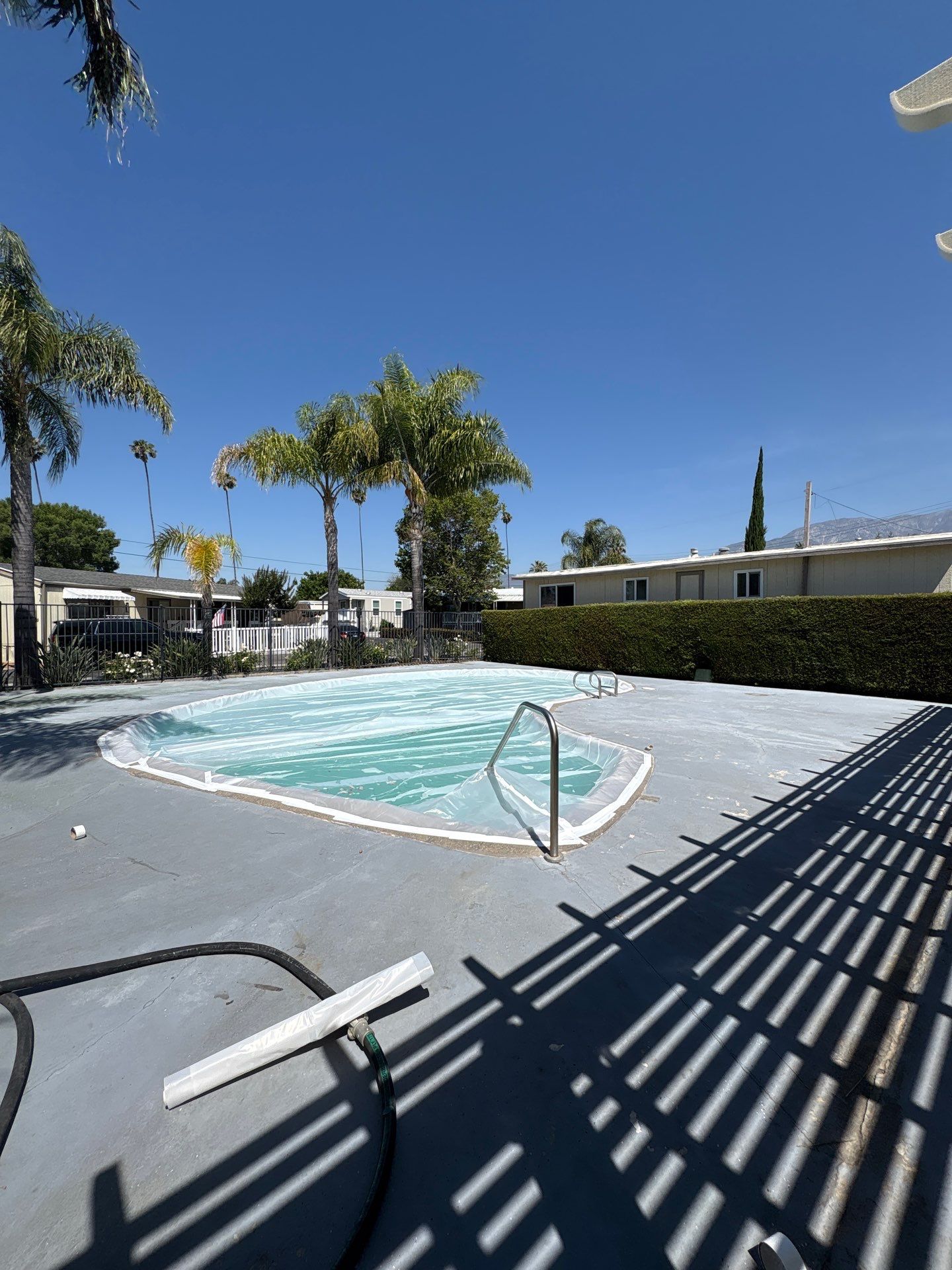 Sandblasting Paint Off Concrete Pool Deck In Rancho Cucamonga, CA by La Power Washing Inc