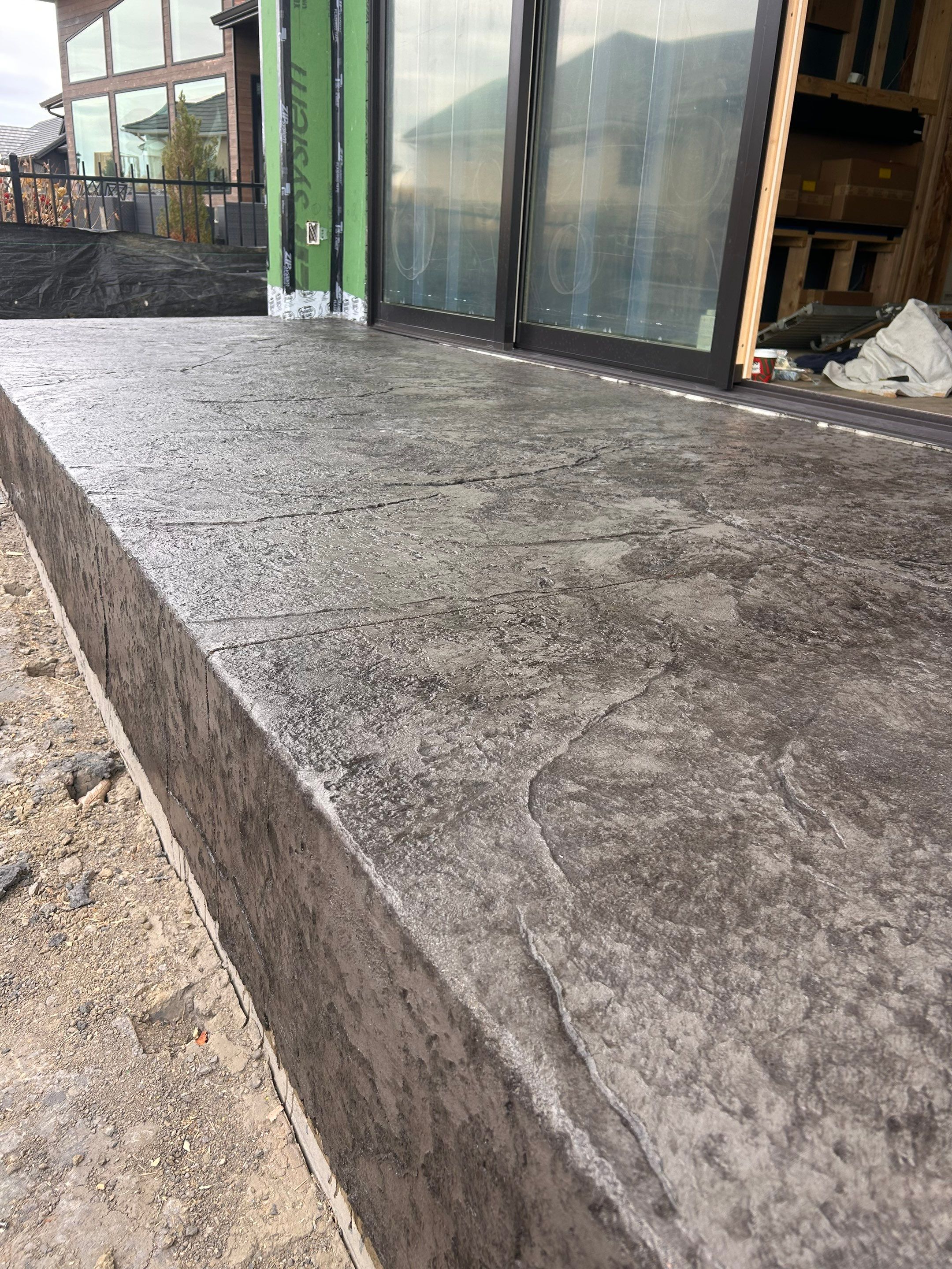 Stamped Concrete Patio and Custom Walkway Installation in Berthoud, Colorado by Center Line Concrete