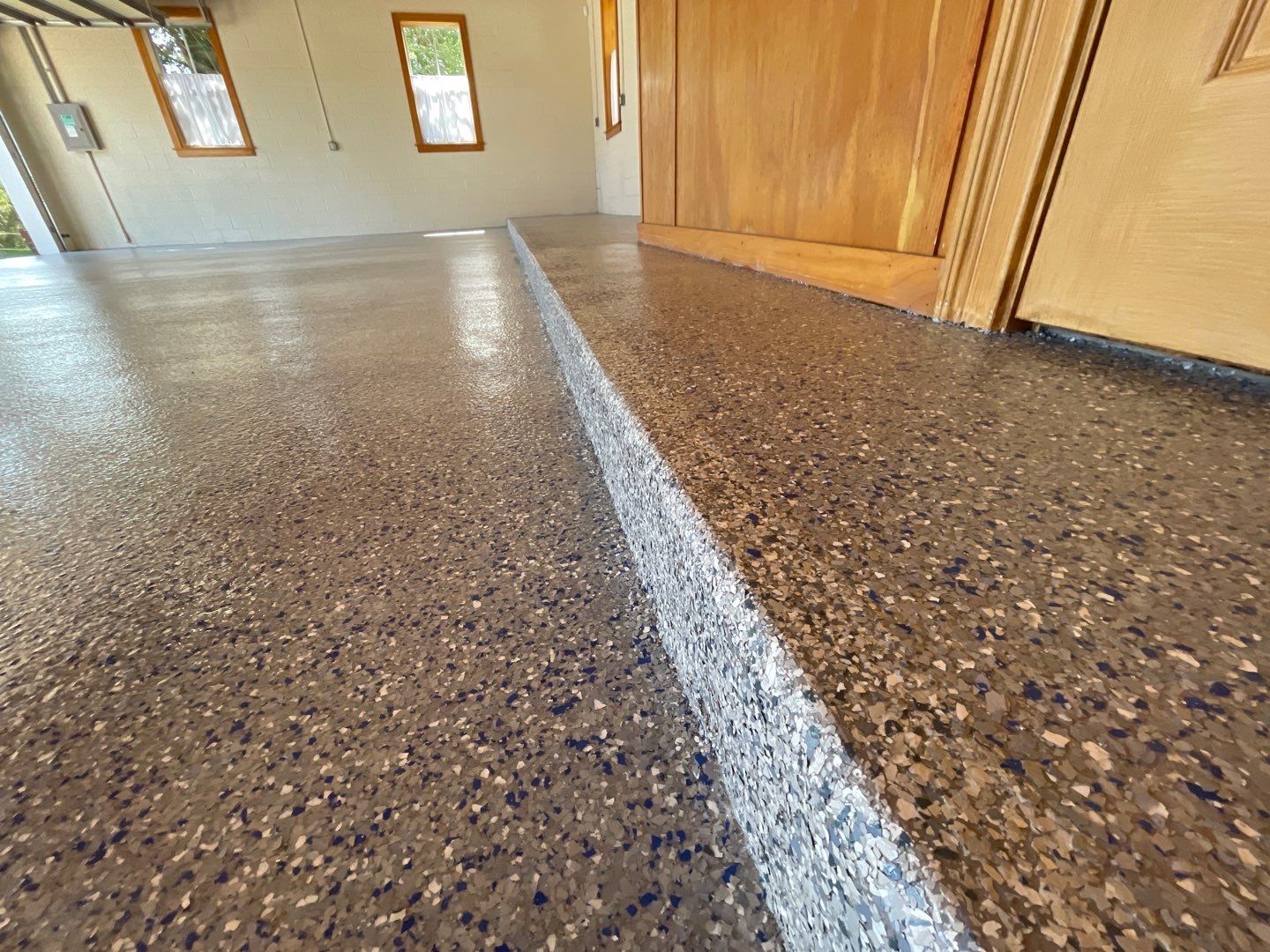 Garages Project in Micanopy, FL in Custom Color by Cross Creek Concrete Coatings