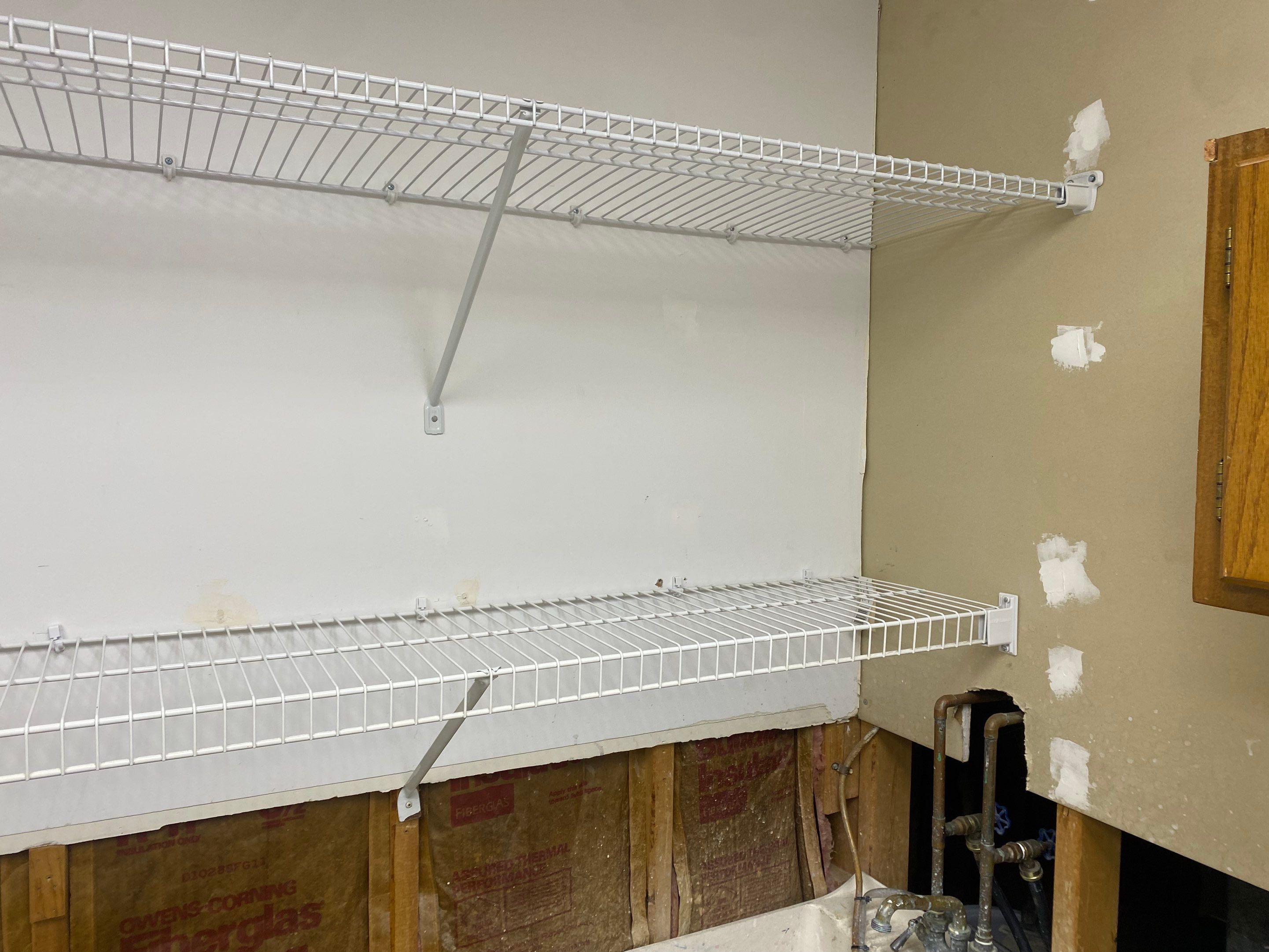 Laundry Room Redmodel using Lifeproof Luxury Vinyl Plank Flooring by The Smet Companies, LLC