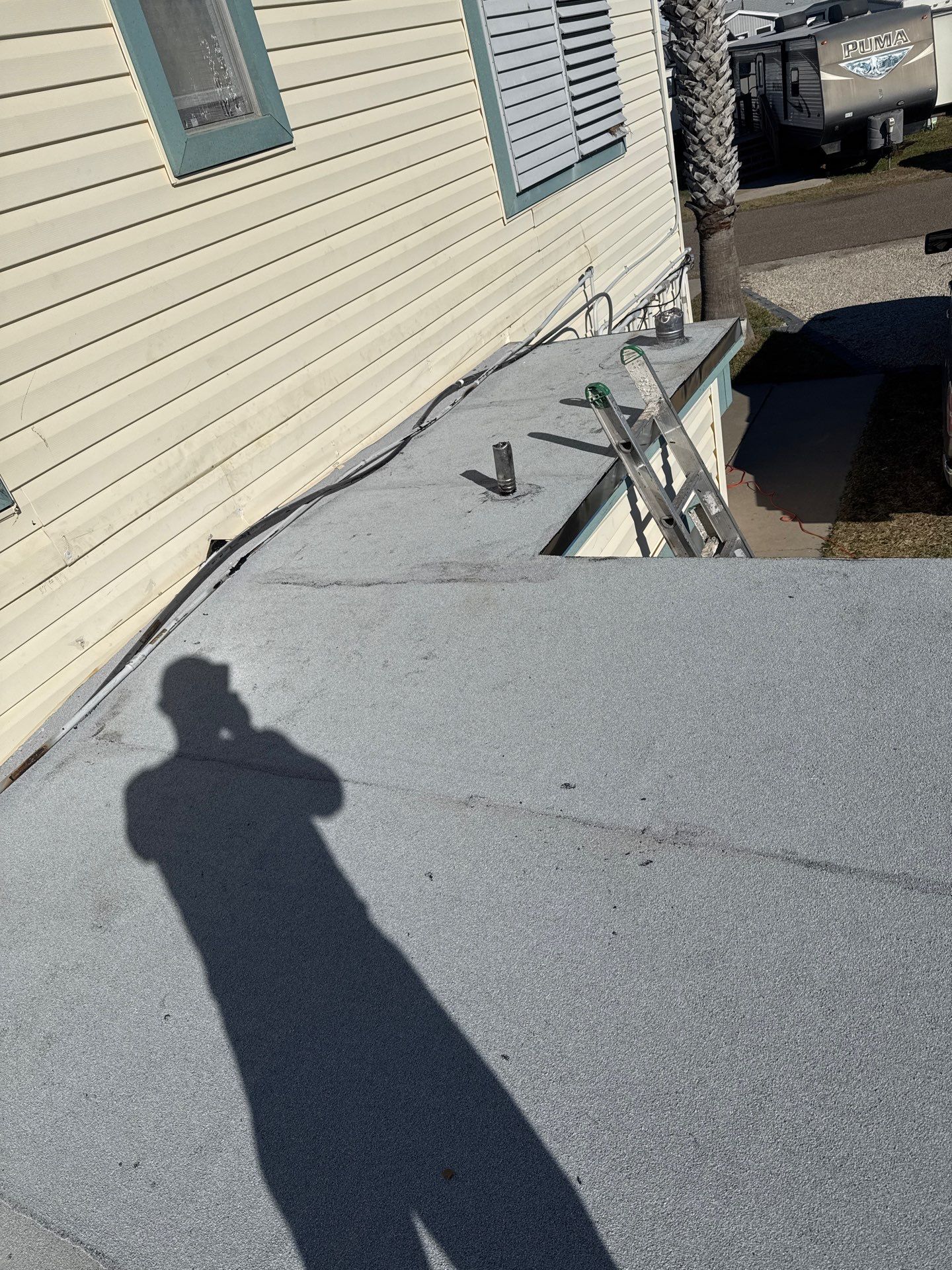 Mustang Island Flat Top by Bayfront Roofing and Construction