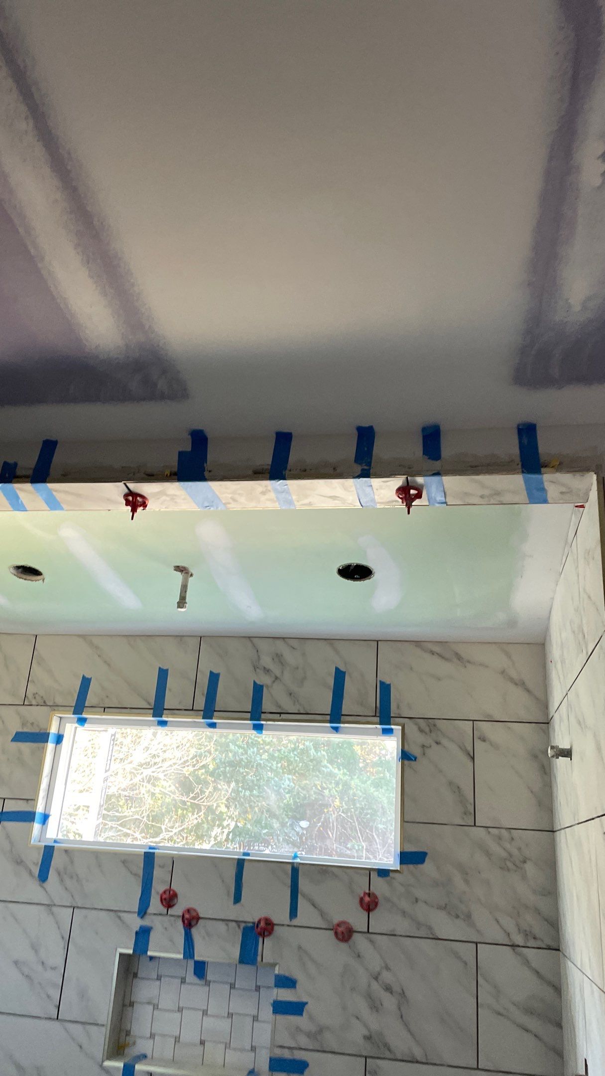 Remodeled Home with new tile floors, Showers and Refinished Oak Floors with stain and Waterbased Finish by Footprints Floors of Coastal Carolina