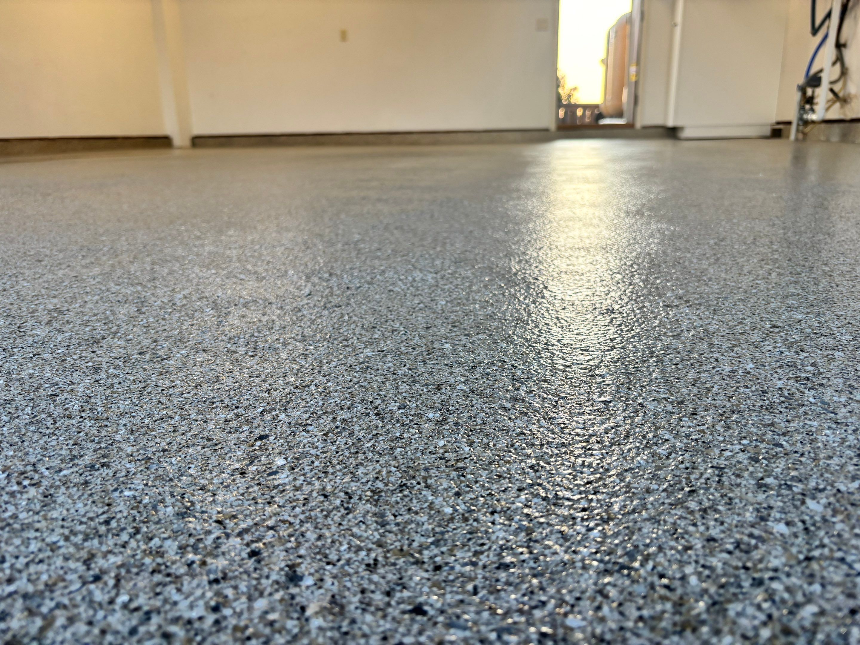 Garage Transformation using Quartzite Hybrid by Croc Coatings, LLC