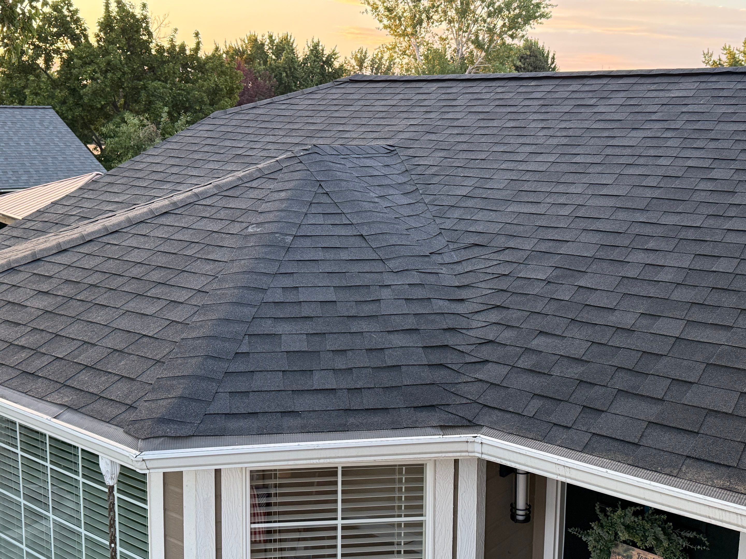 Residential Roof Replacement and Seamless Gutter Installation in Boise by Olive Roofing